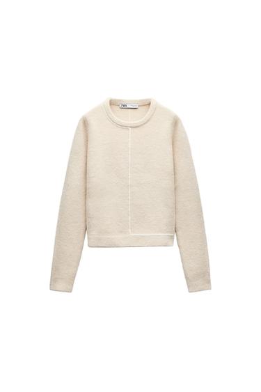 KNIT SWEATER WITH CONTRASTING PIPING