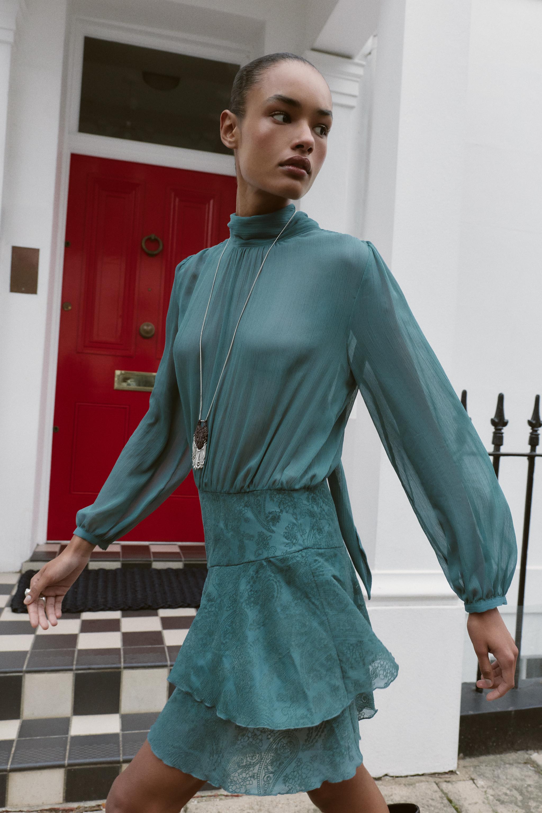 RUFFLED COMBINATION MINI DRESS