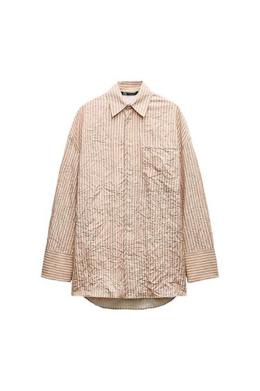 Beige striped shirt with a crinkled texture, classic collar and chest pocket. White background. Visible neck label.