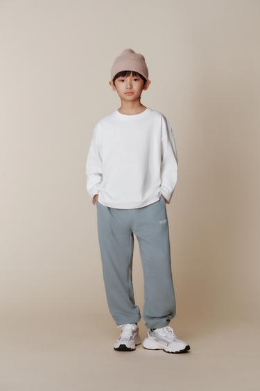 PANTALÓN JOGGER TEXTO - Gris perla de Zara