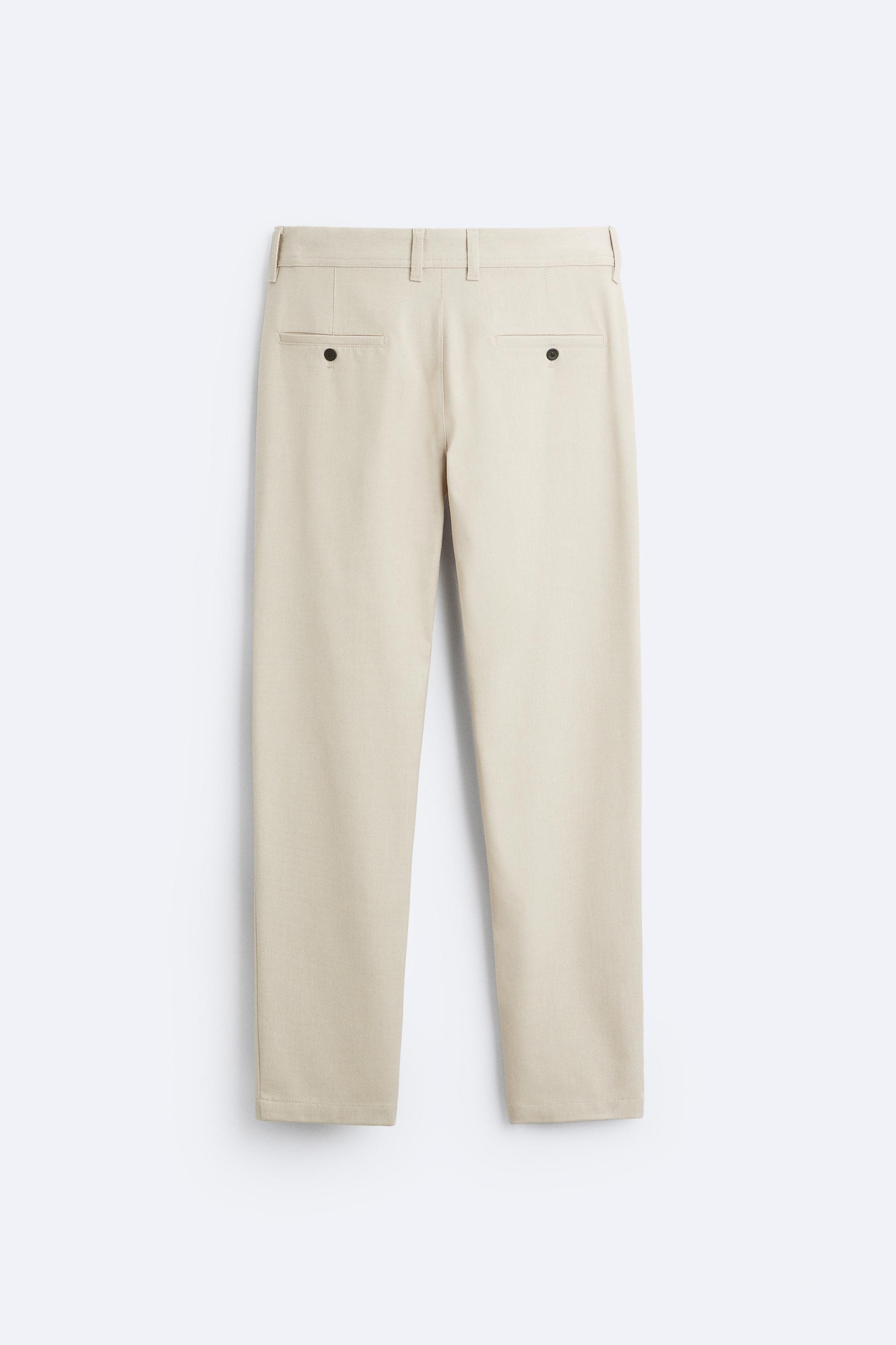 TEXTURED COMFORT TROUSERS - Oyster-white