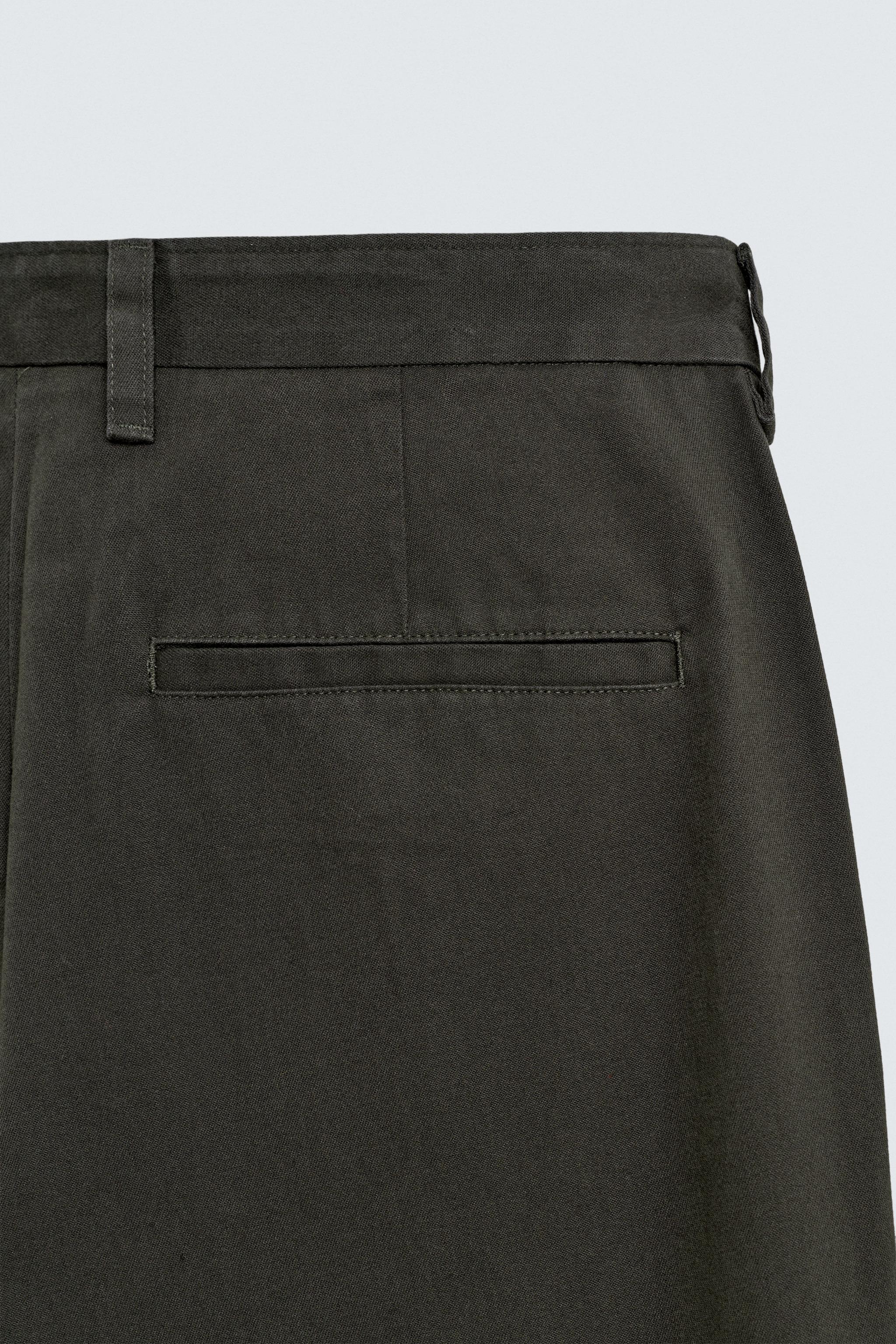 REGULAR FIT PLEATED PANTS