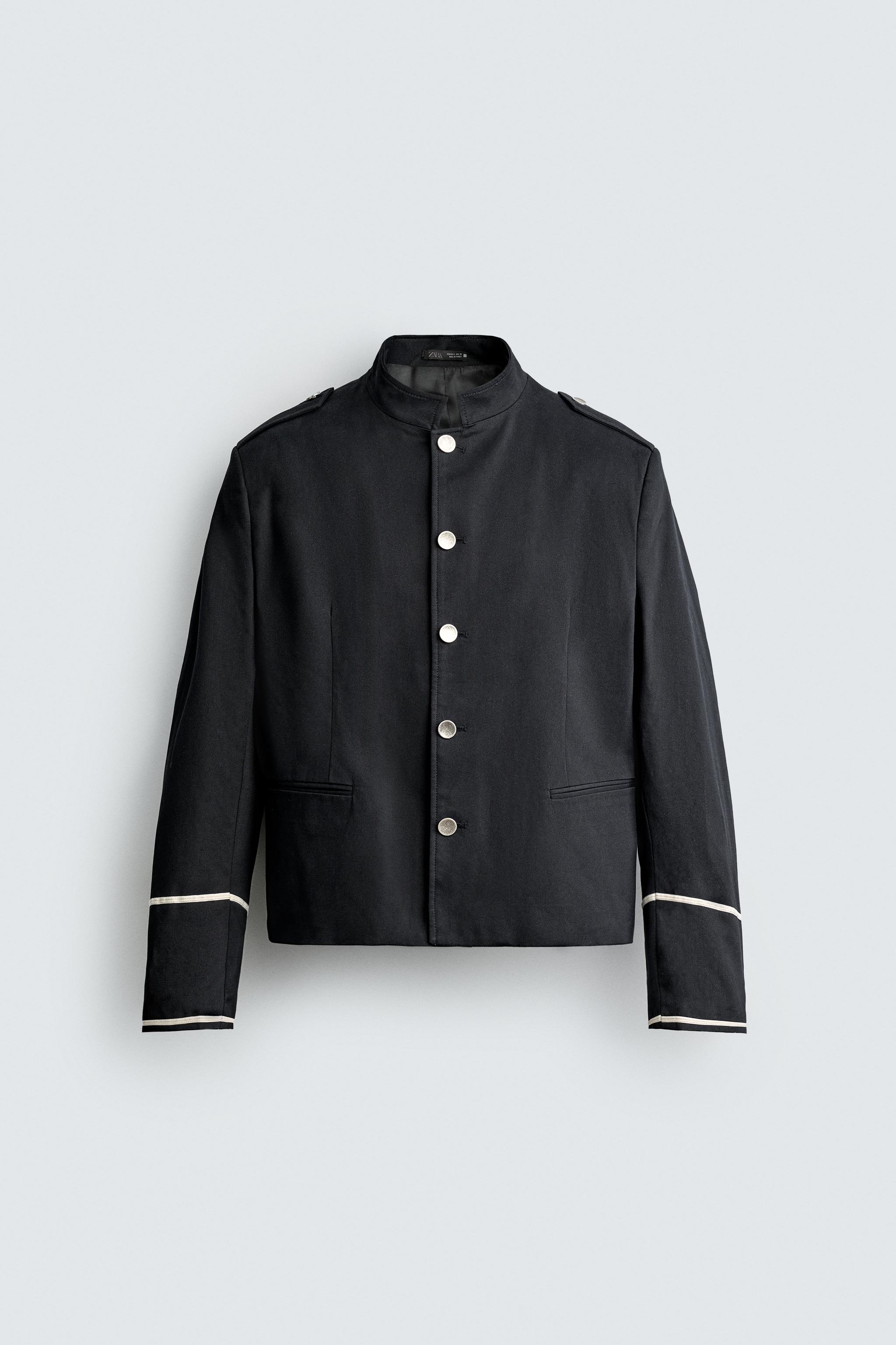 VESTE COURTE À CONTRASTES