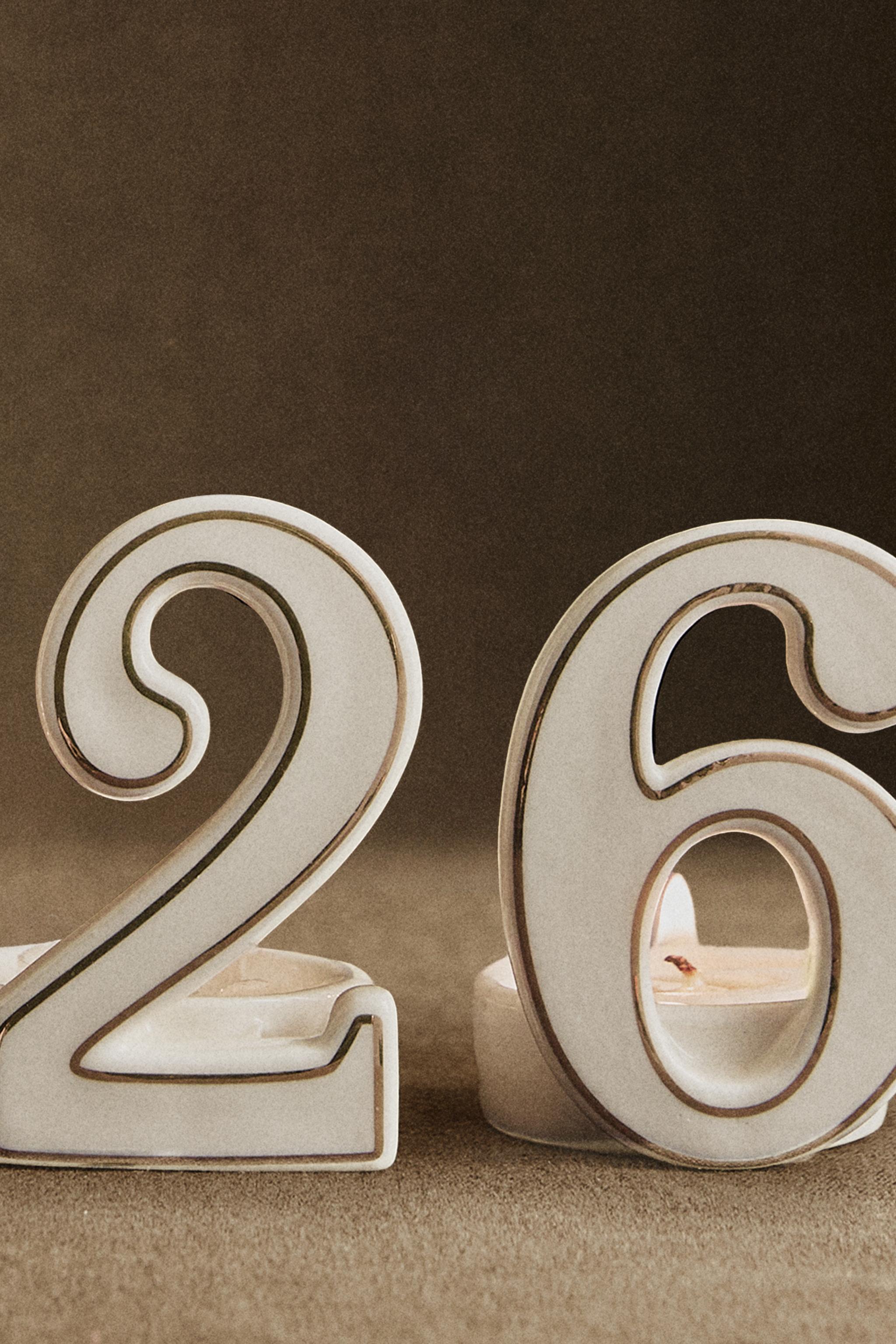 CHRISTMAS 2026 PORCELAIN TEALIGHT HOLDER (SET OF 4)