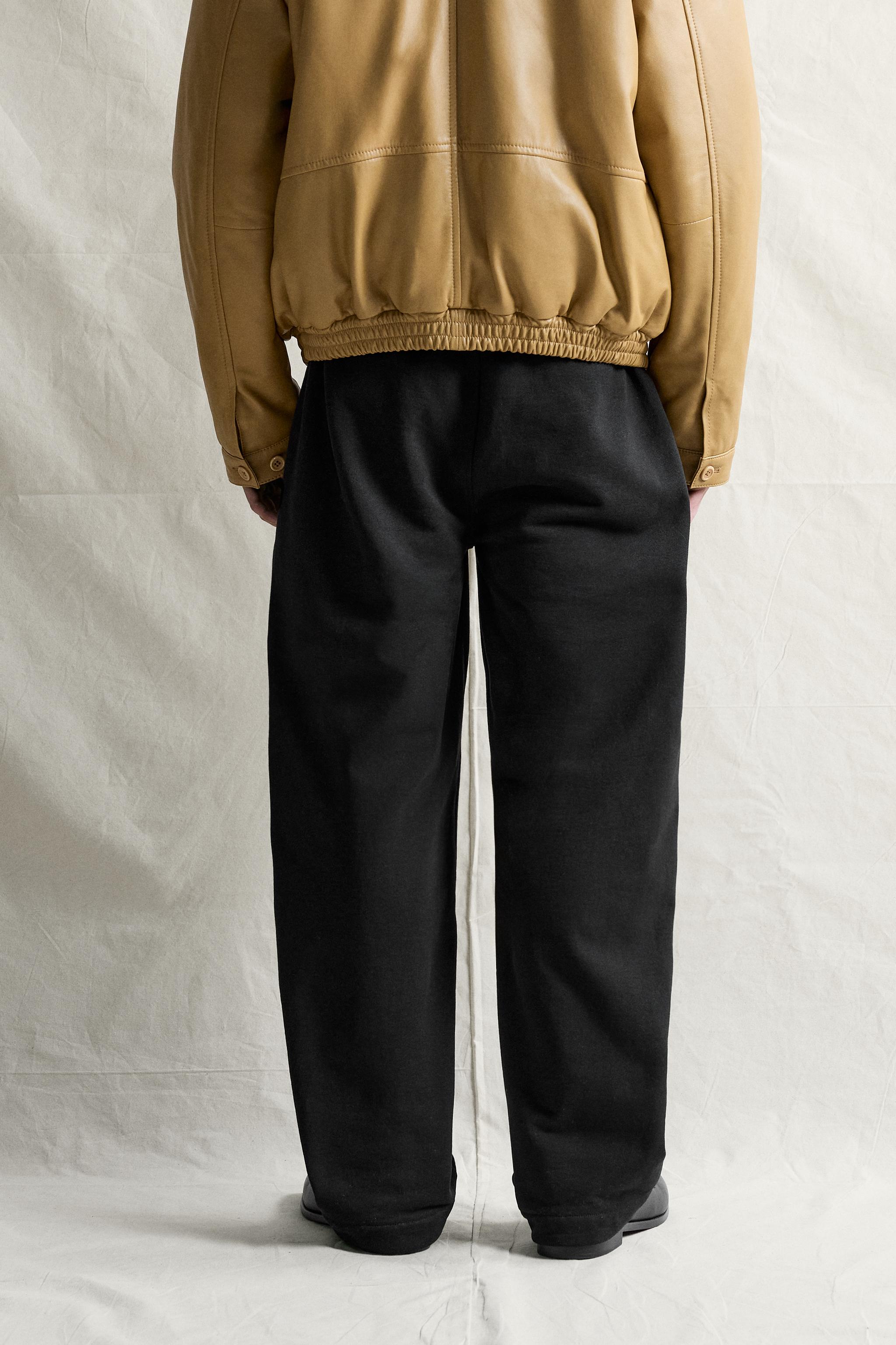 PANTALON DE JOGGING À PLIS LATÉRAUX