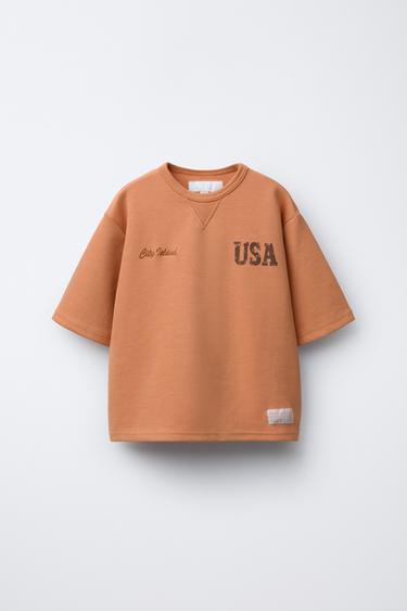CAMISETA INTERLOCK TEXTO - Naranja de Zara