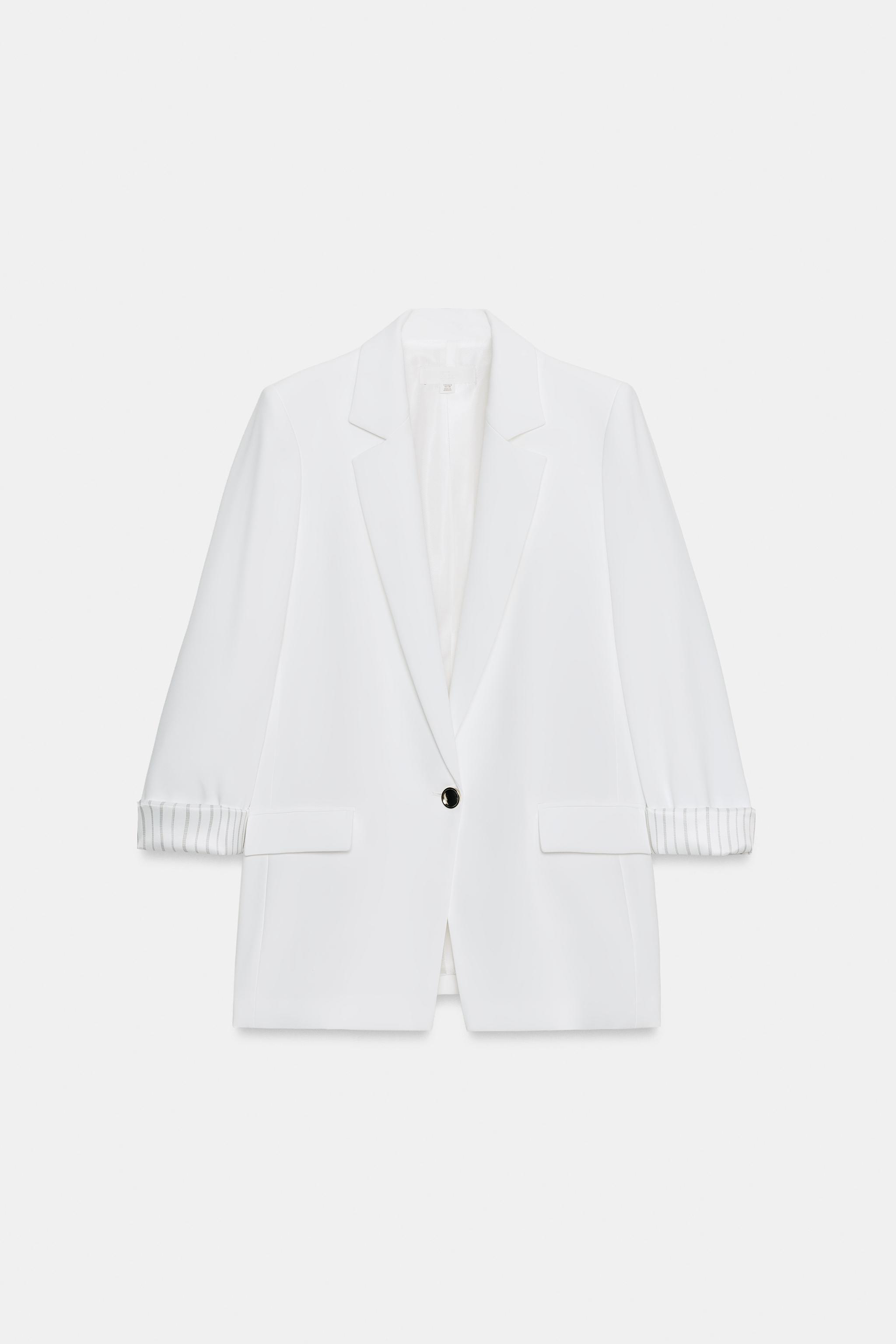 VESTE À MANCHES RETROUSSÉES ET POIGNETS IMPRIMÉS