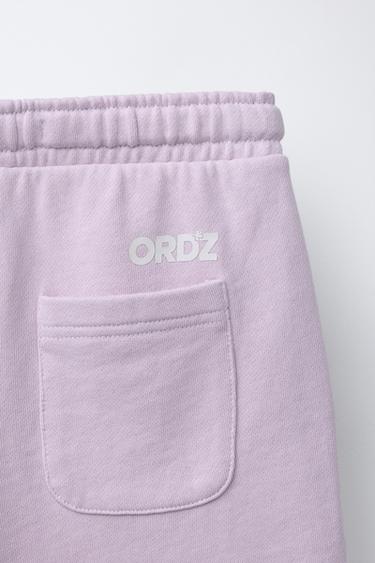 BERMUDA EN MOLLETON TEINT SUR PIÈCE AVEC LOGO - Lilas clair de Zara - Image 3