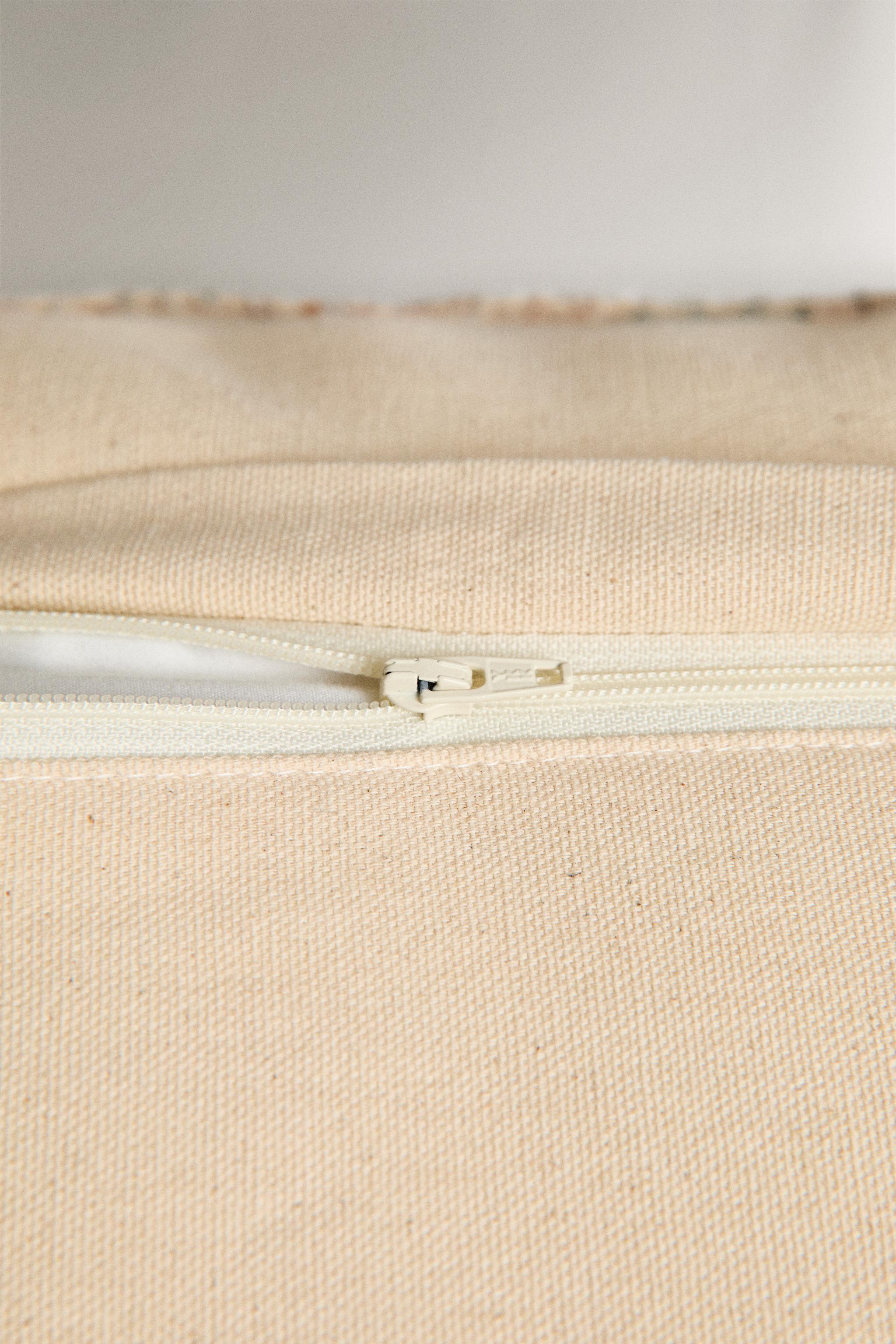 VINTAGE-EFFECT CUSHION COVER