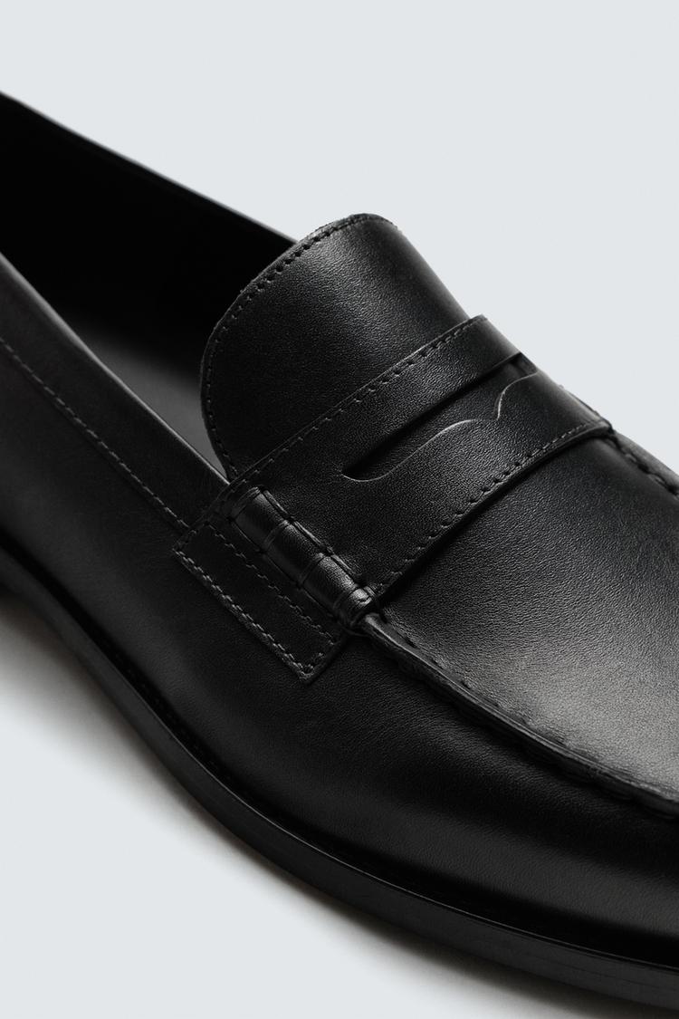MOCASSINS EN CUIR AVEC MASQUE