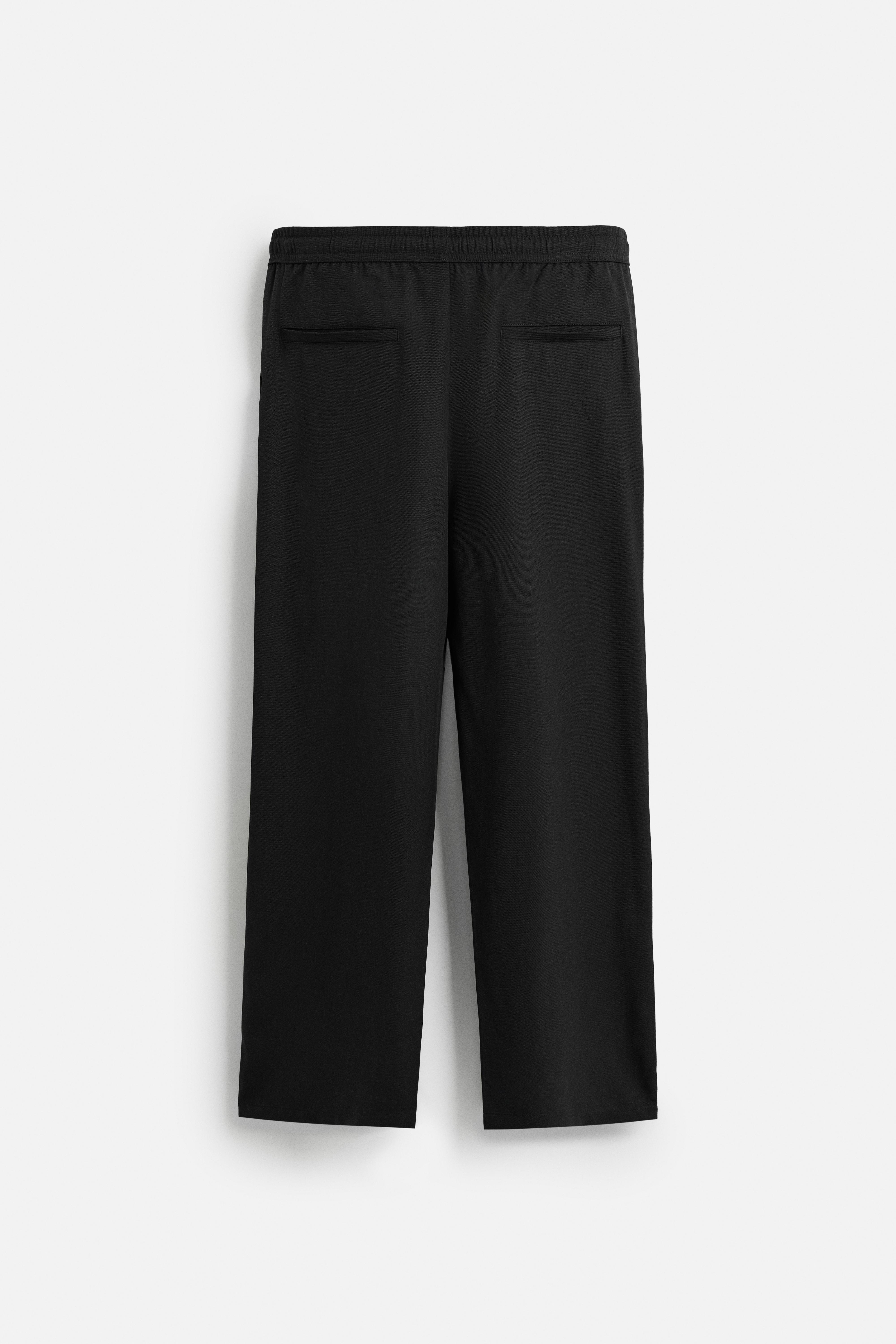 RELAXED FIT FLOWY PANTS