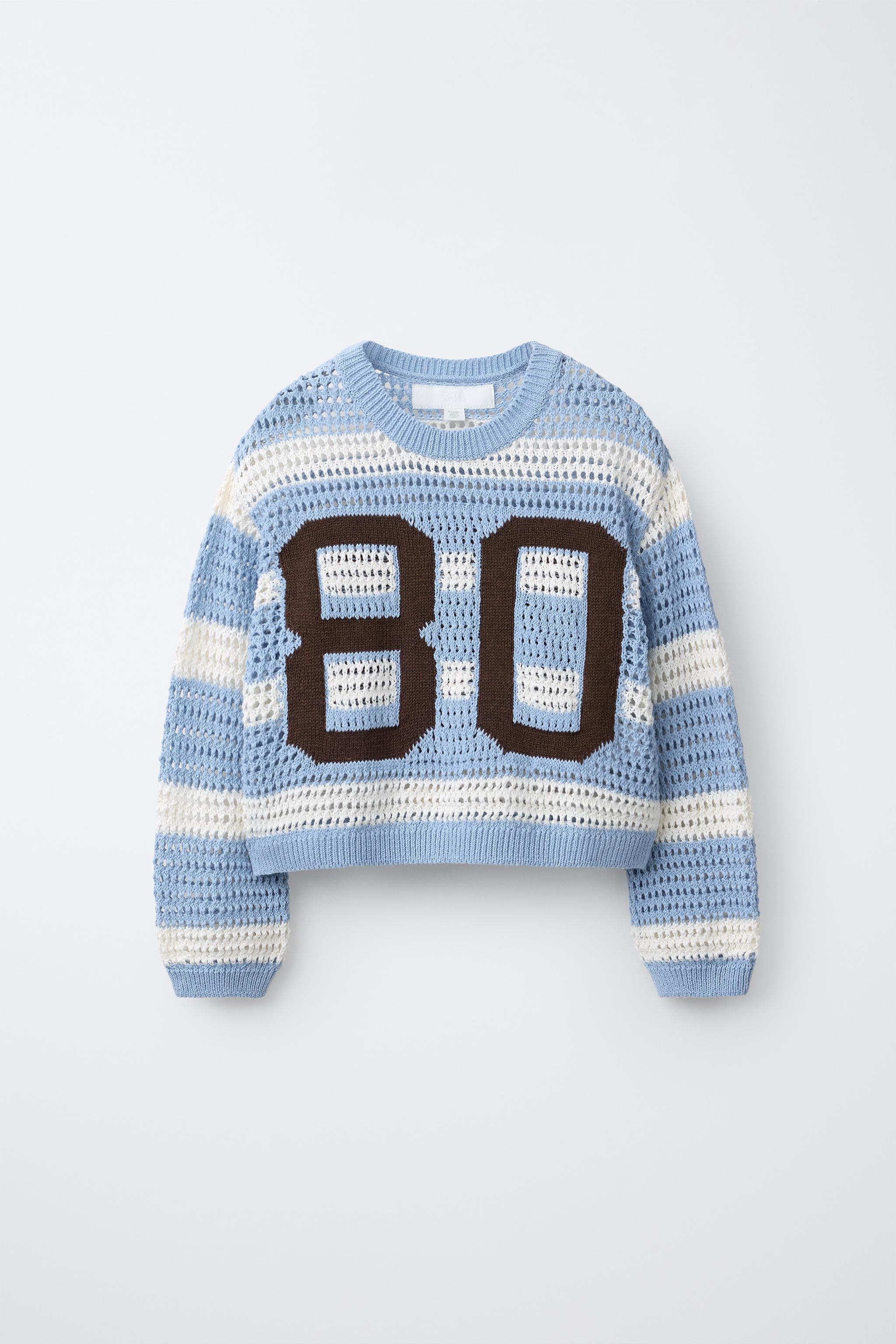 PULL EN MAILLE À RAYURES AVEC NUMÉRO