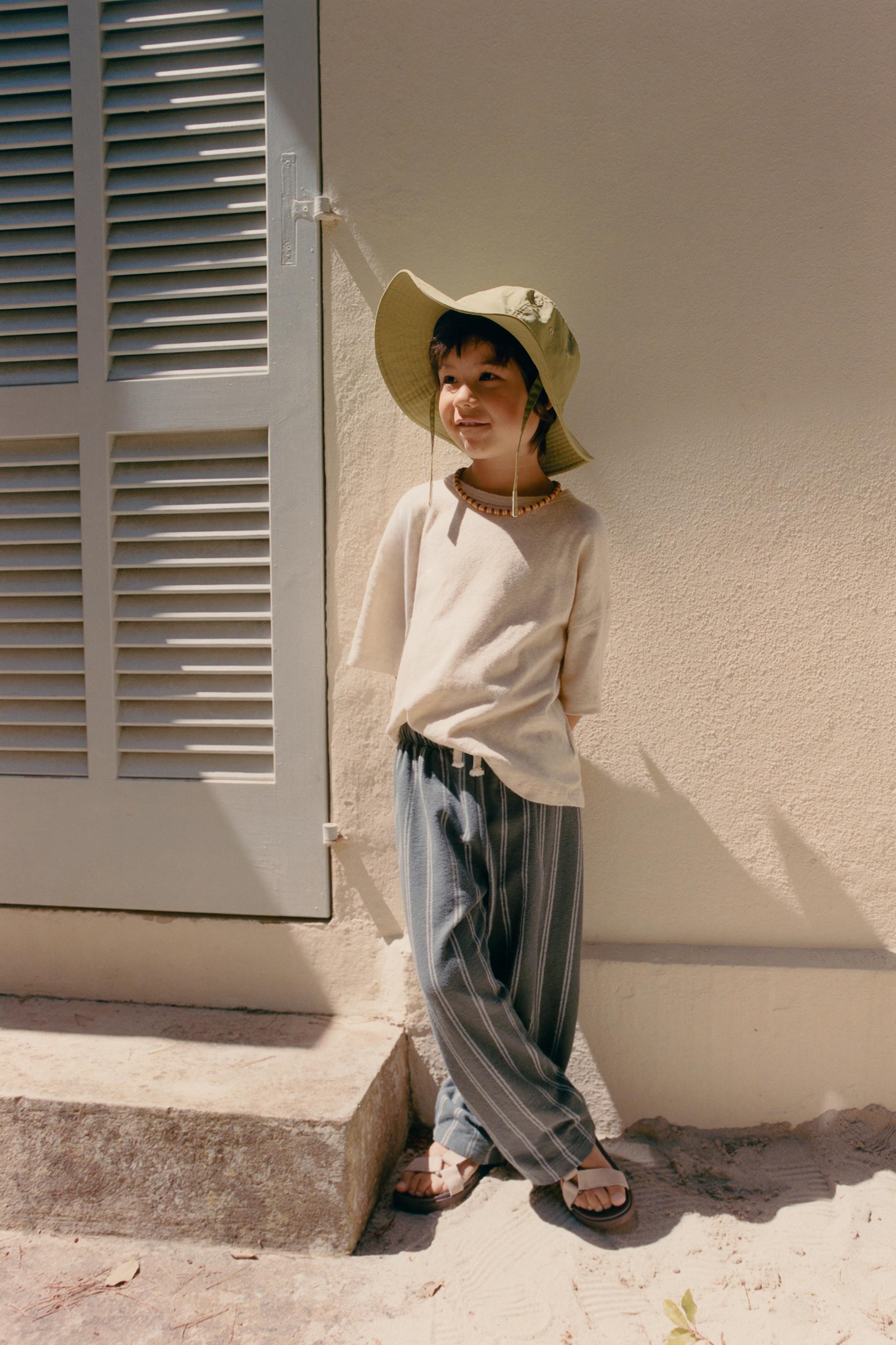 STRIPED RELAXED PANTS