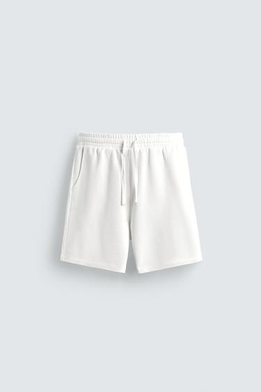 BERMUDES JOGGER BÀSIQUES RENTADES - Blanc de Zara