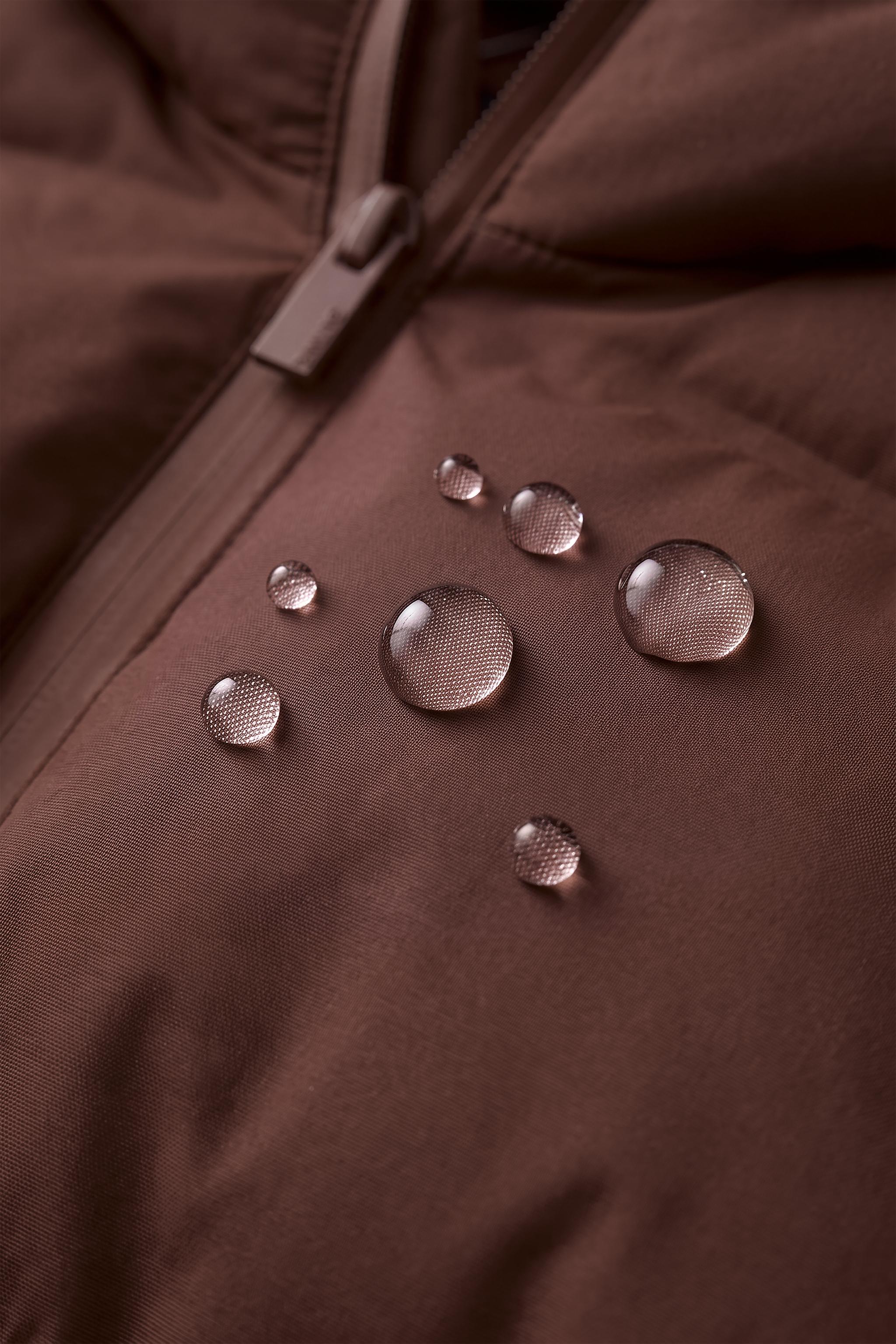 MANTEAU MATELASSÉ À CAPUCHE DÉPERLANT
