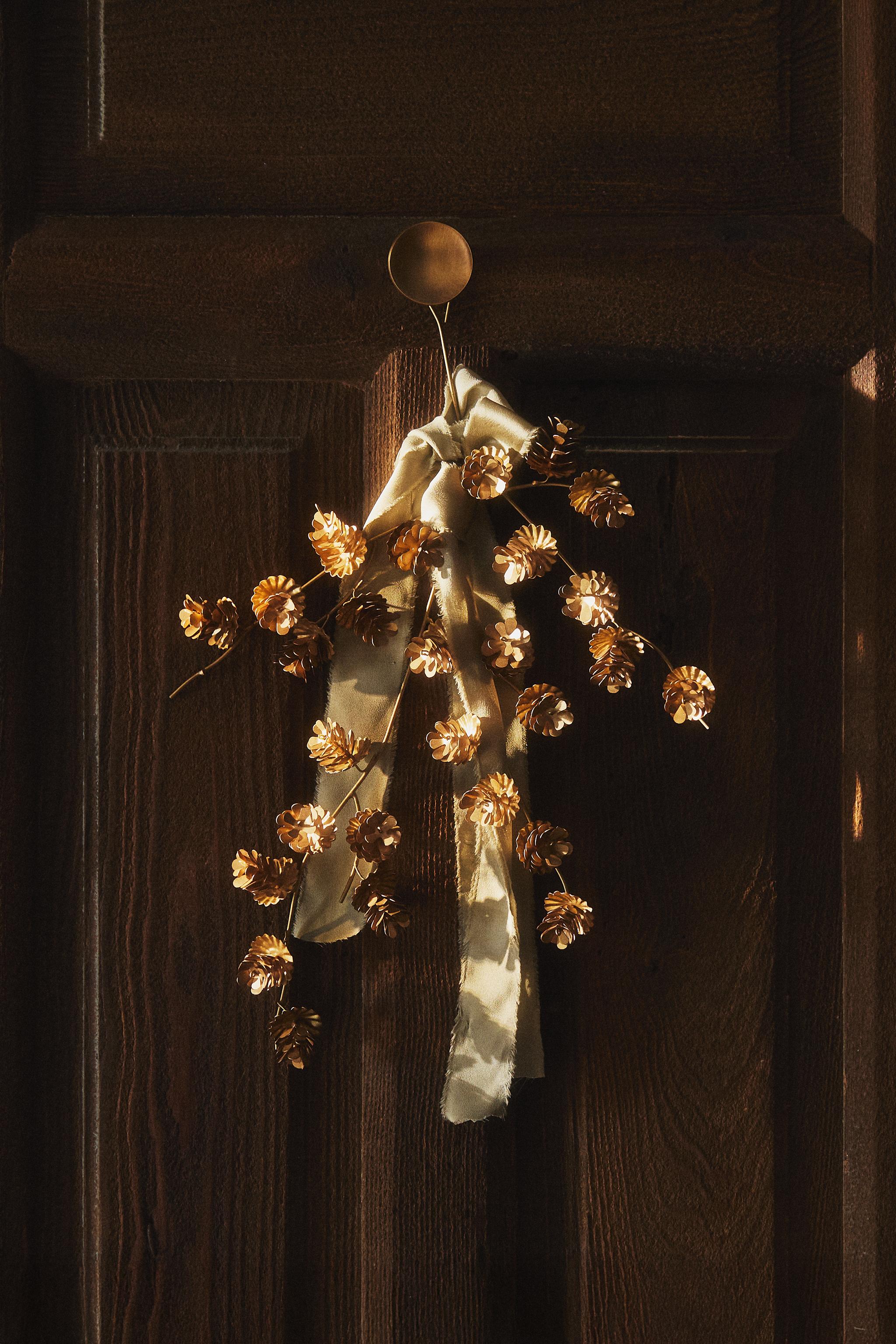 ANTIQUE-FINISH CHRISTMAS PINE CONE BRANCH ORNAMENT