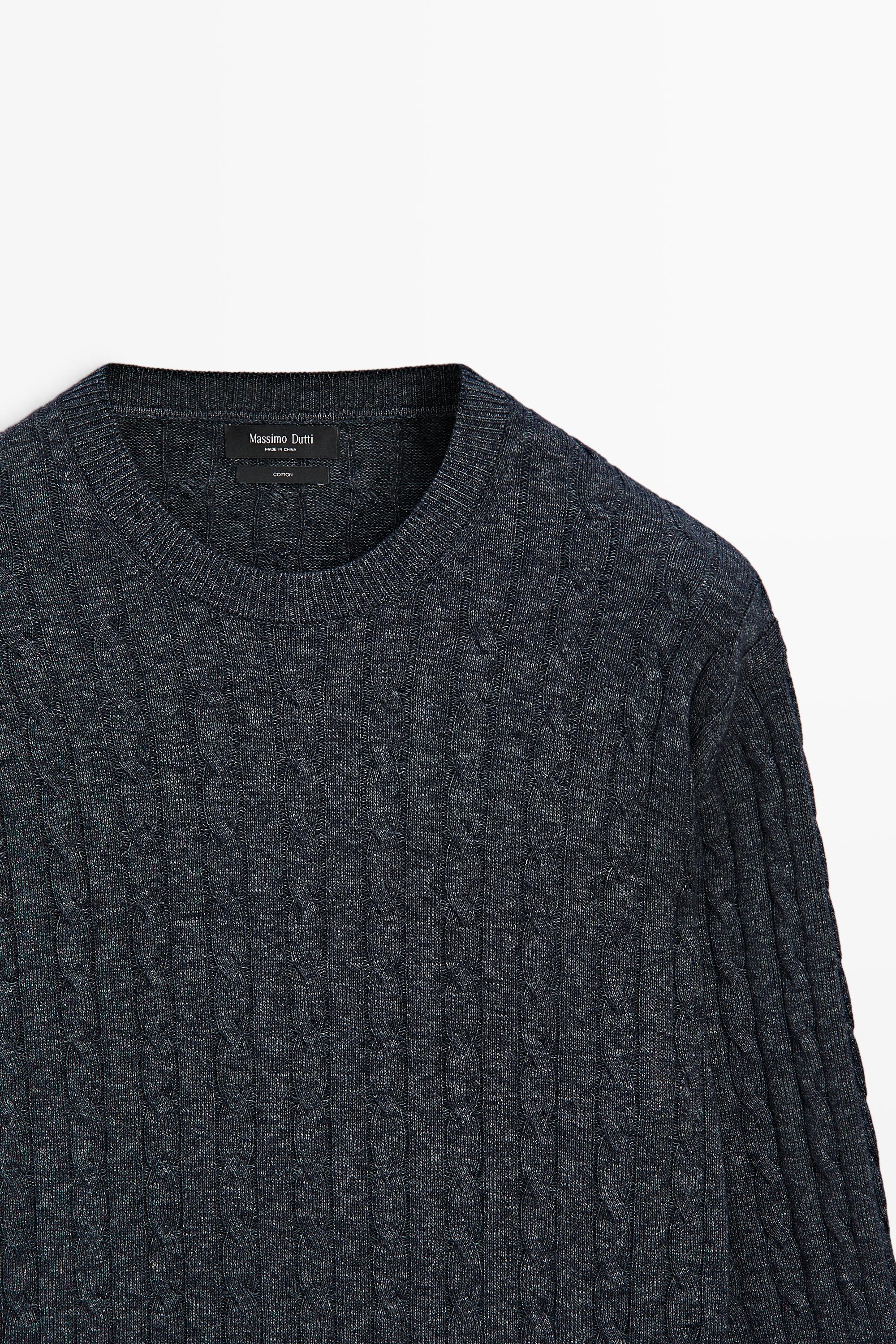 Cable knit round neck sweater