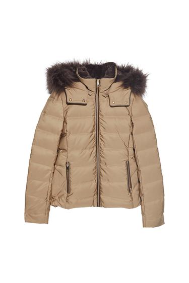Front view of a beige padded jacket with a fur-lined hood and zip pockets.