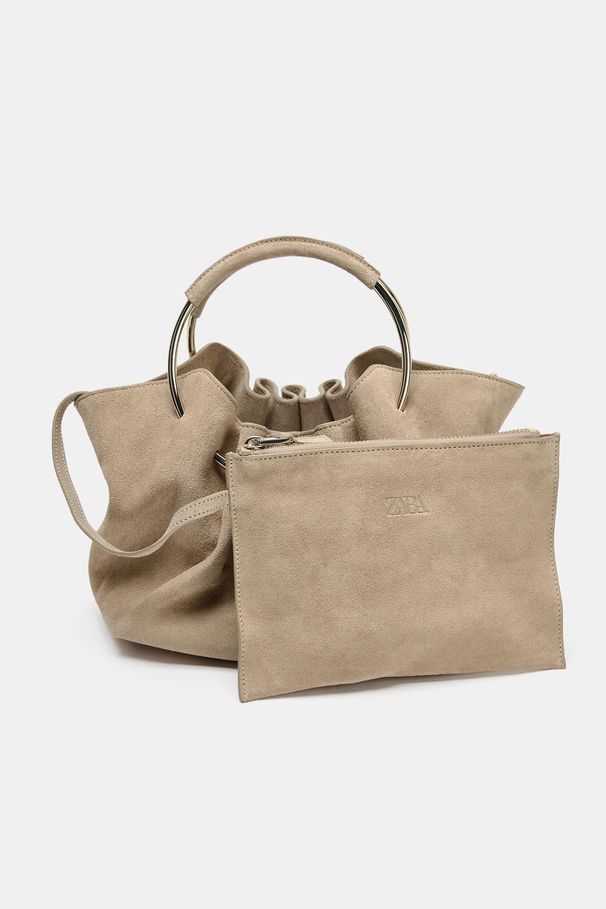 RIGID HANDLE SPLIT LEATHER BUCKET BAG