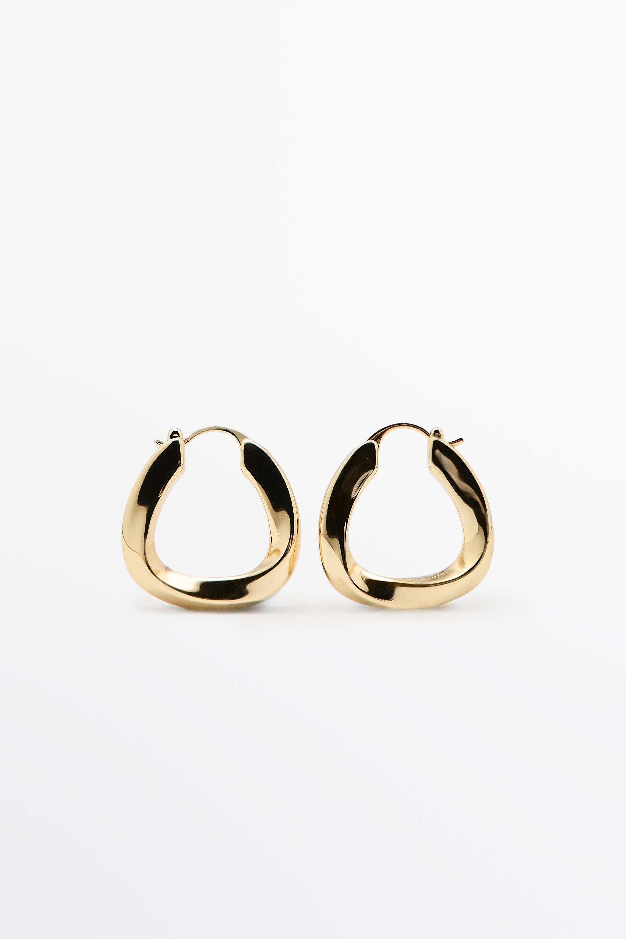 Triangular hoop earrings — Golden