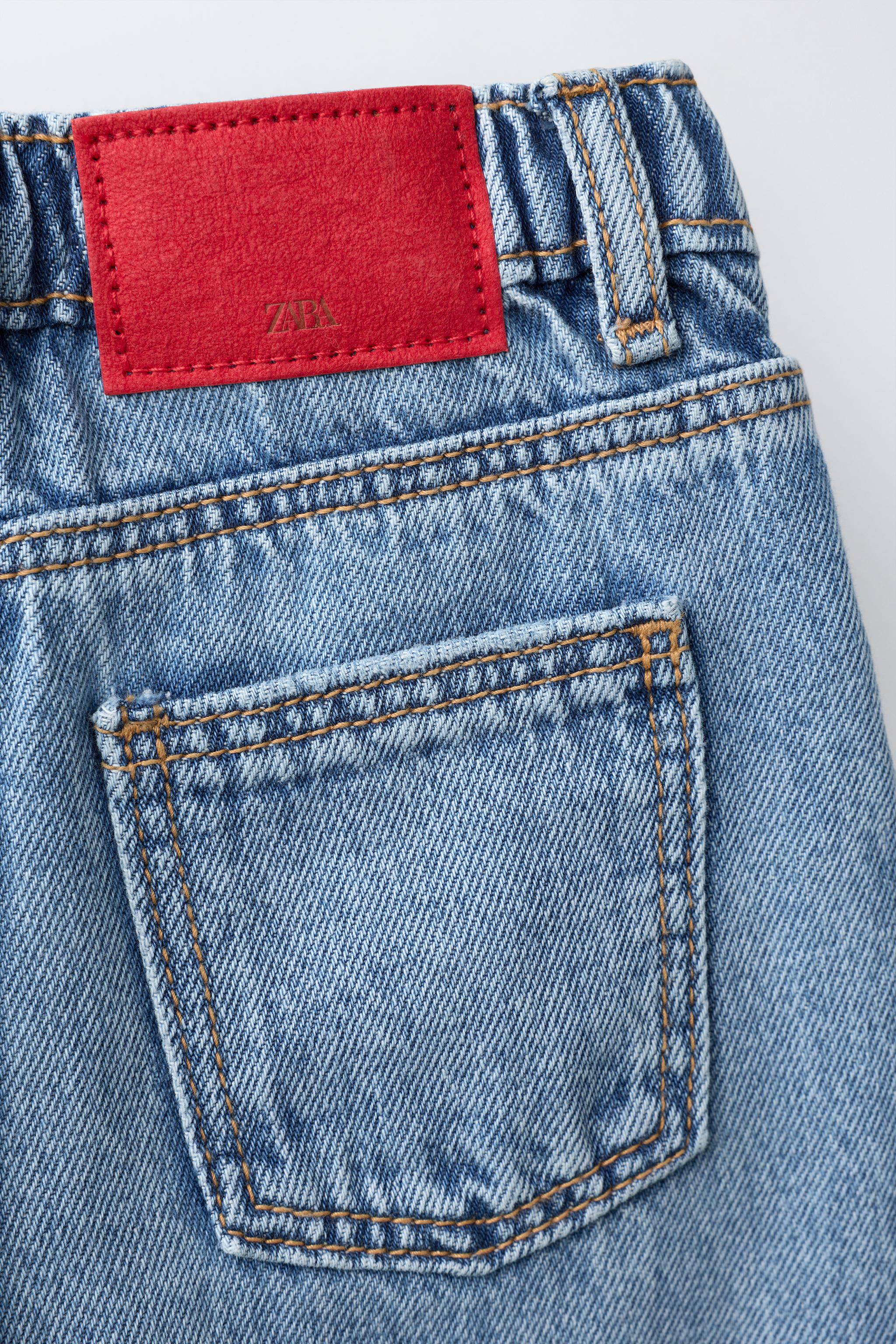 DISTRESSED BARREL JEANS