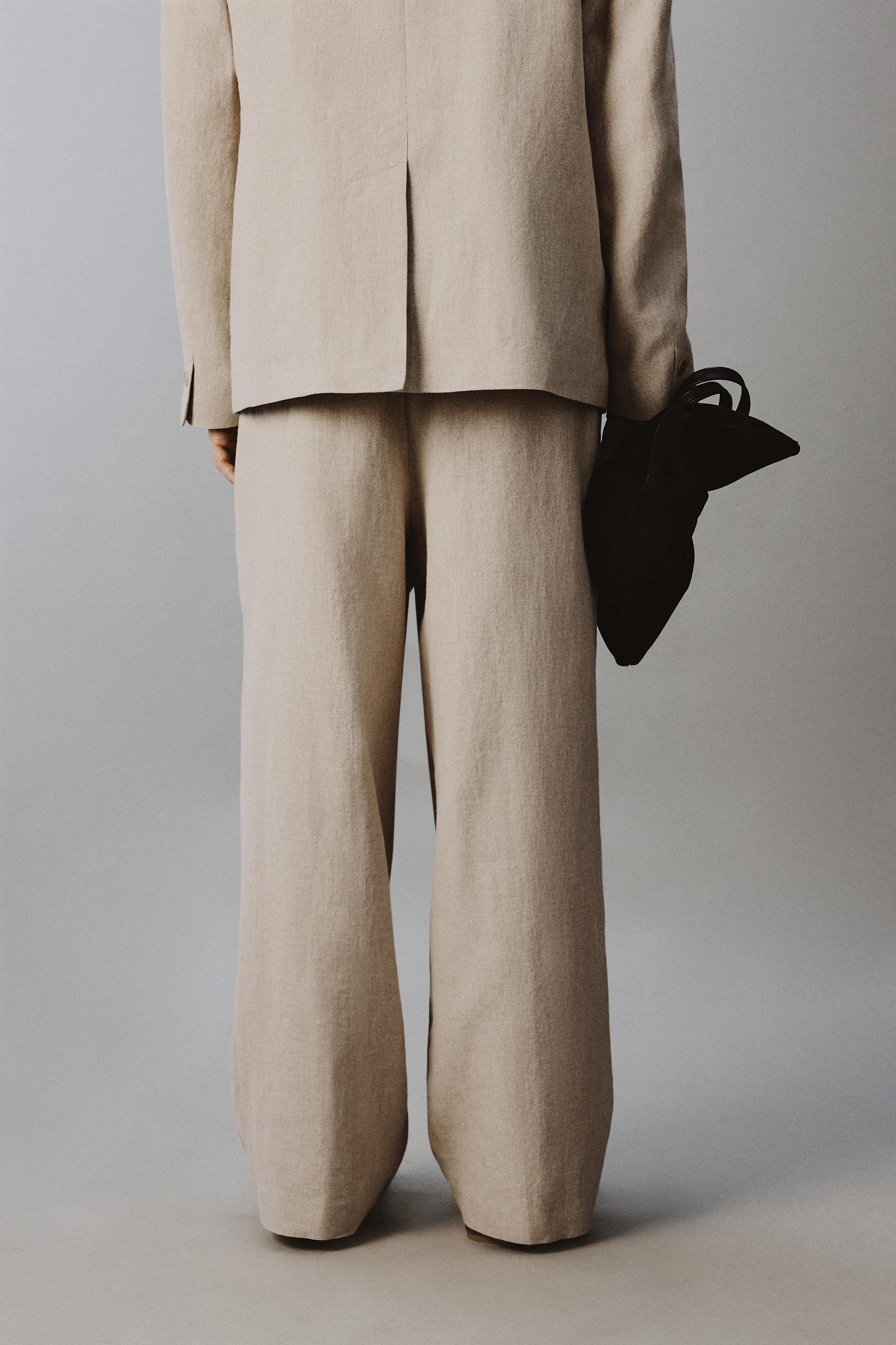 RELAXED FIT PLEATED SUIT PANTS