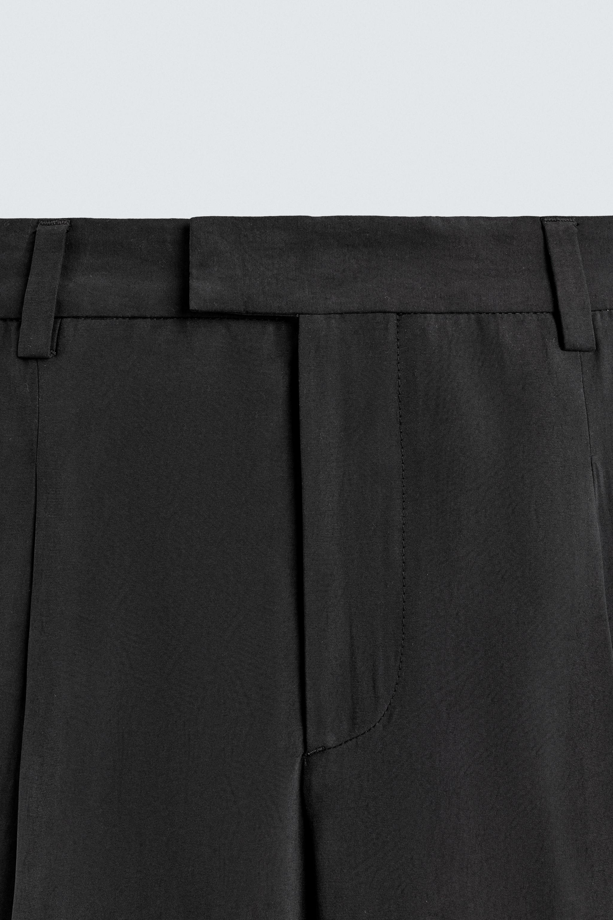 RELAXED FIT FLOWY PANTS