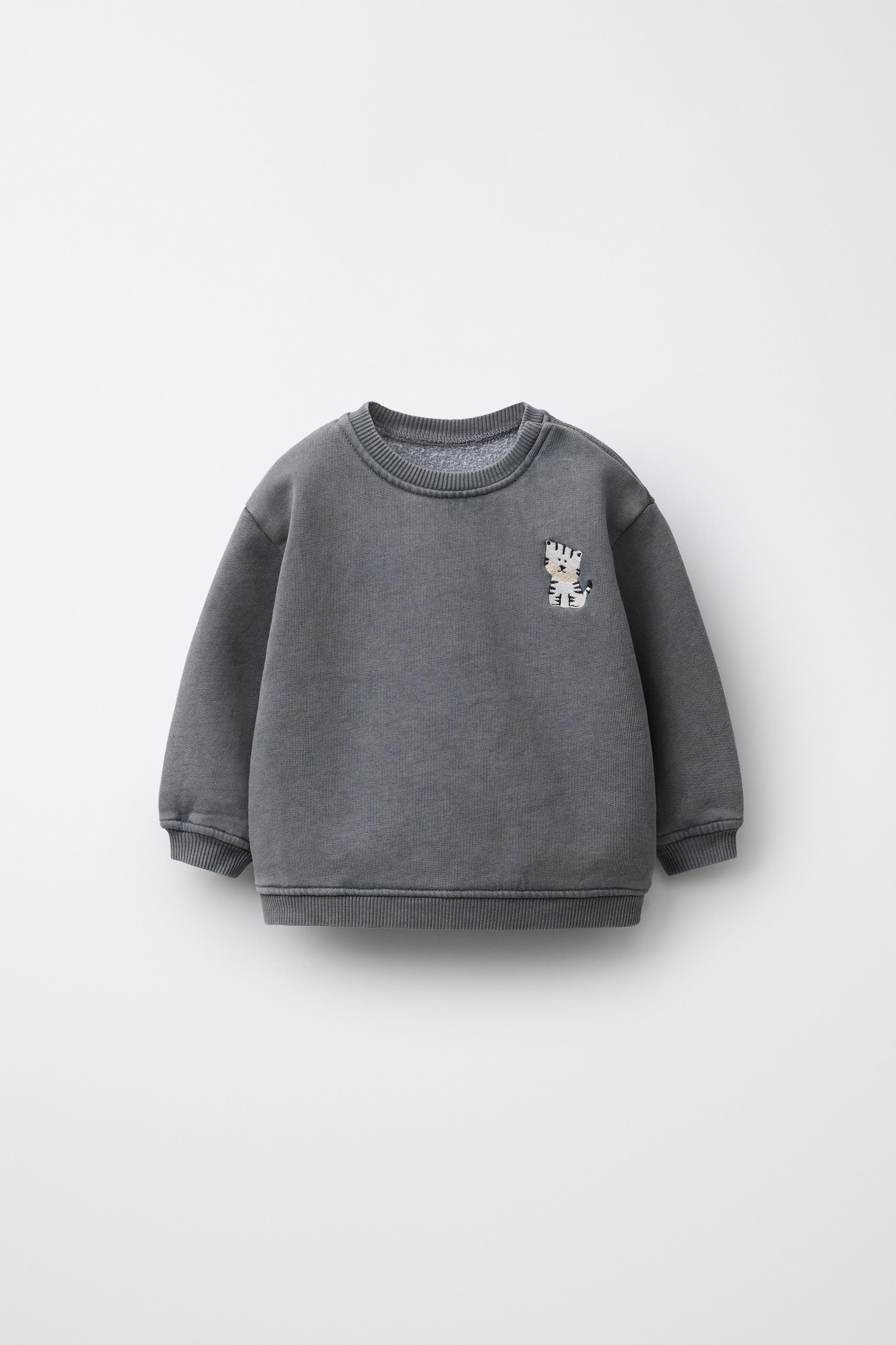EMBROIDERED WASHED EFFECT SWEATSHIRT