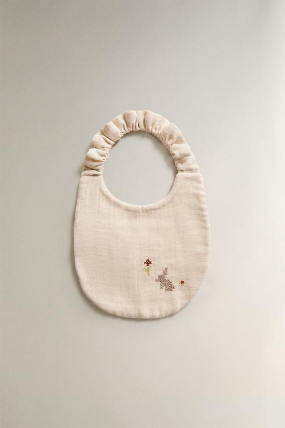 EMBROIDERED MUSLIN BABY BIB - بيج فاتح الخاص بـ Zara - صورة 0