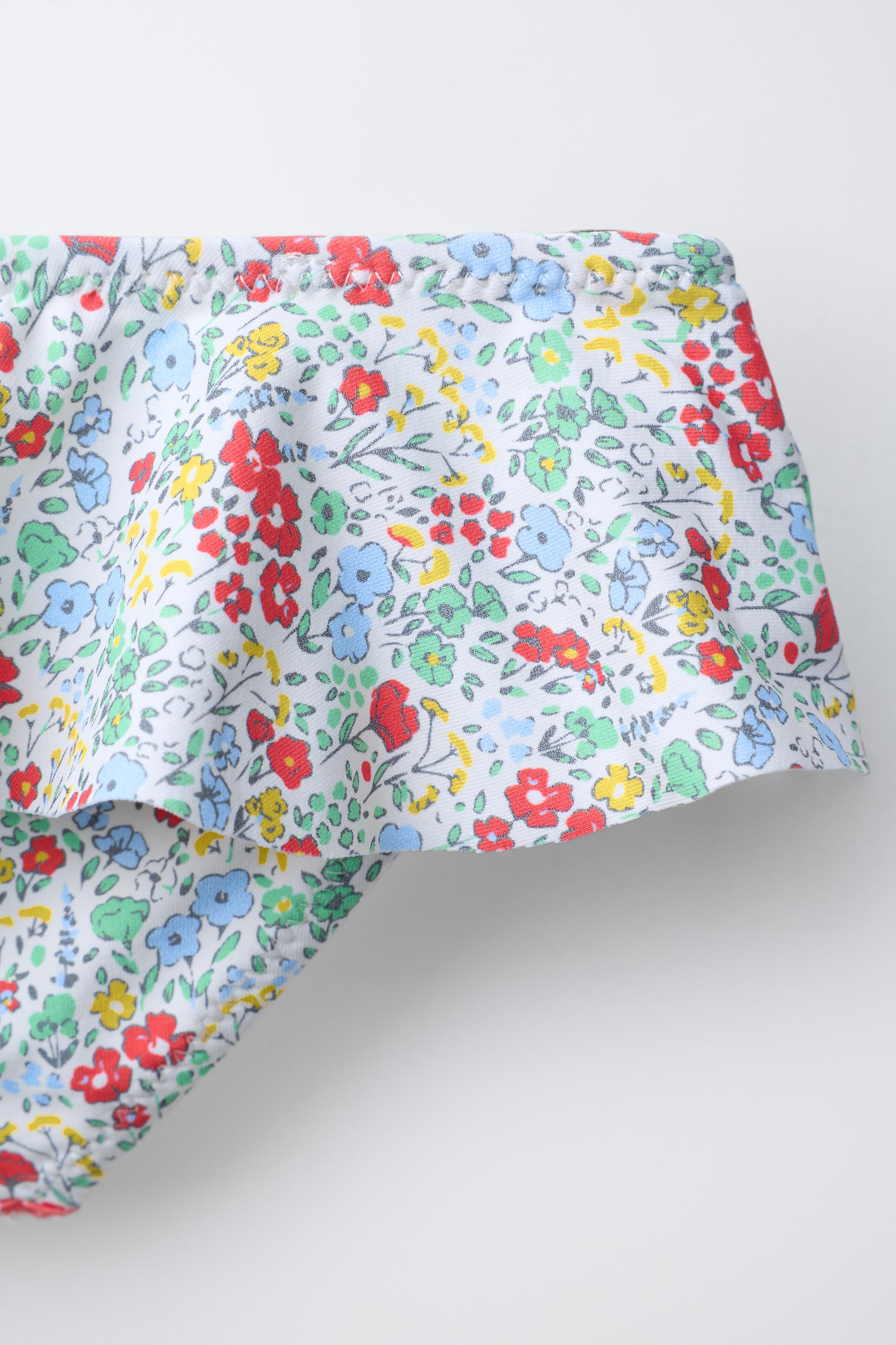1-6 ANS/ CULOTTE À FLEURS ET VOLANTS