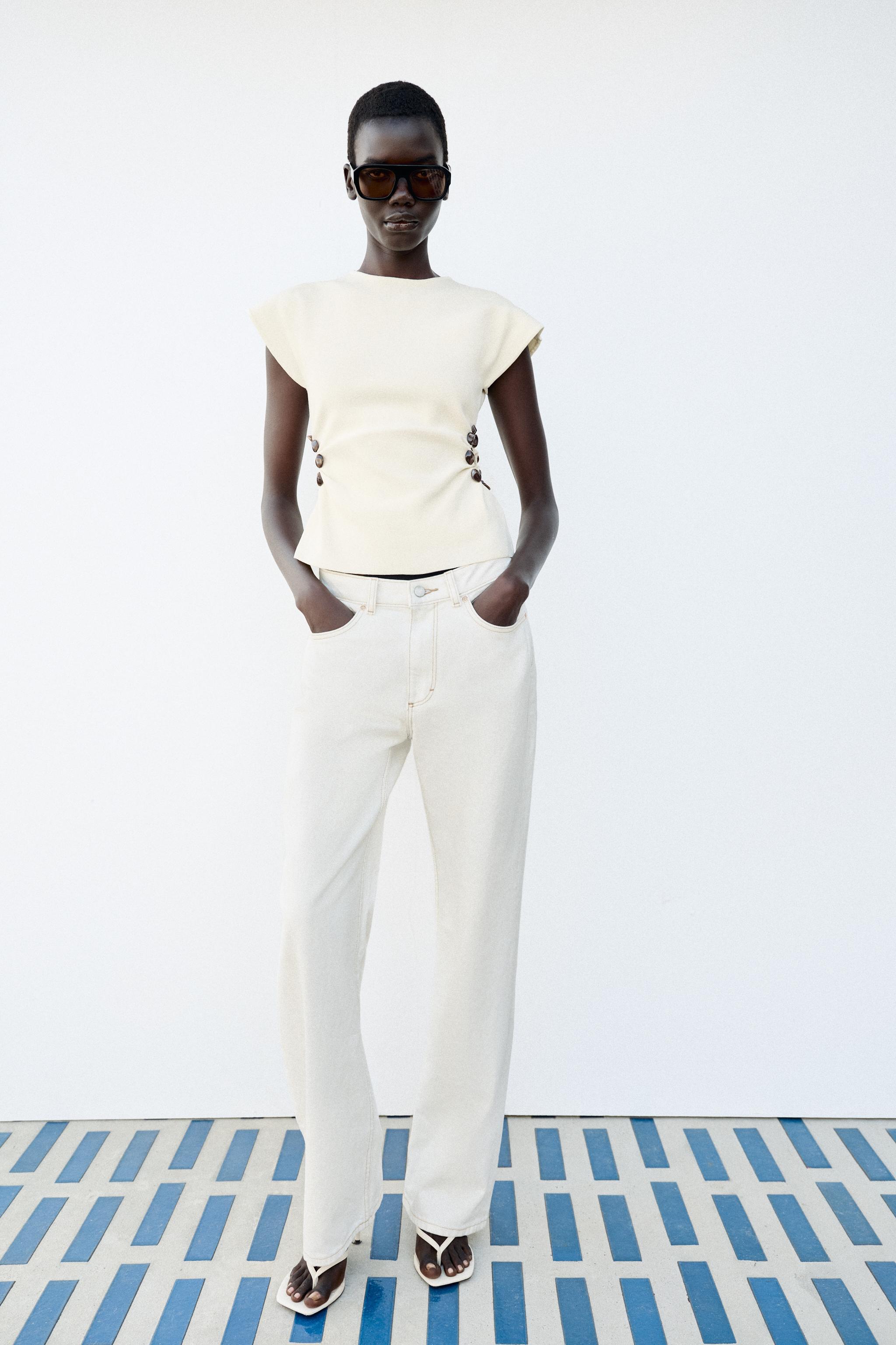 BEADED CUT OUT KNIT TOP
