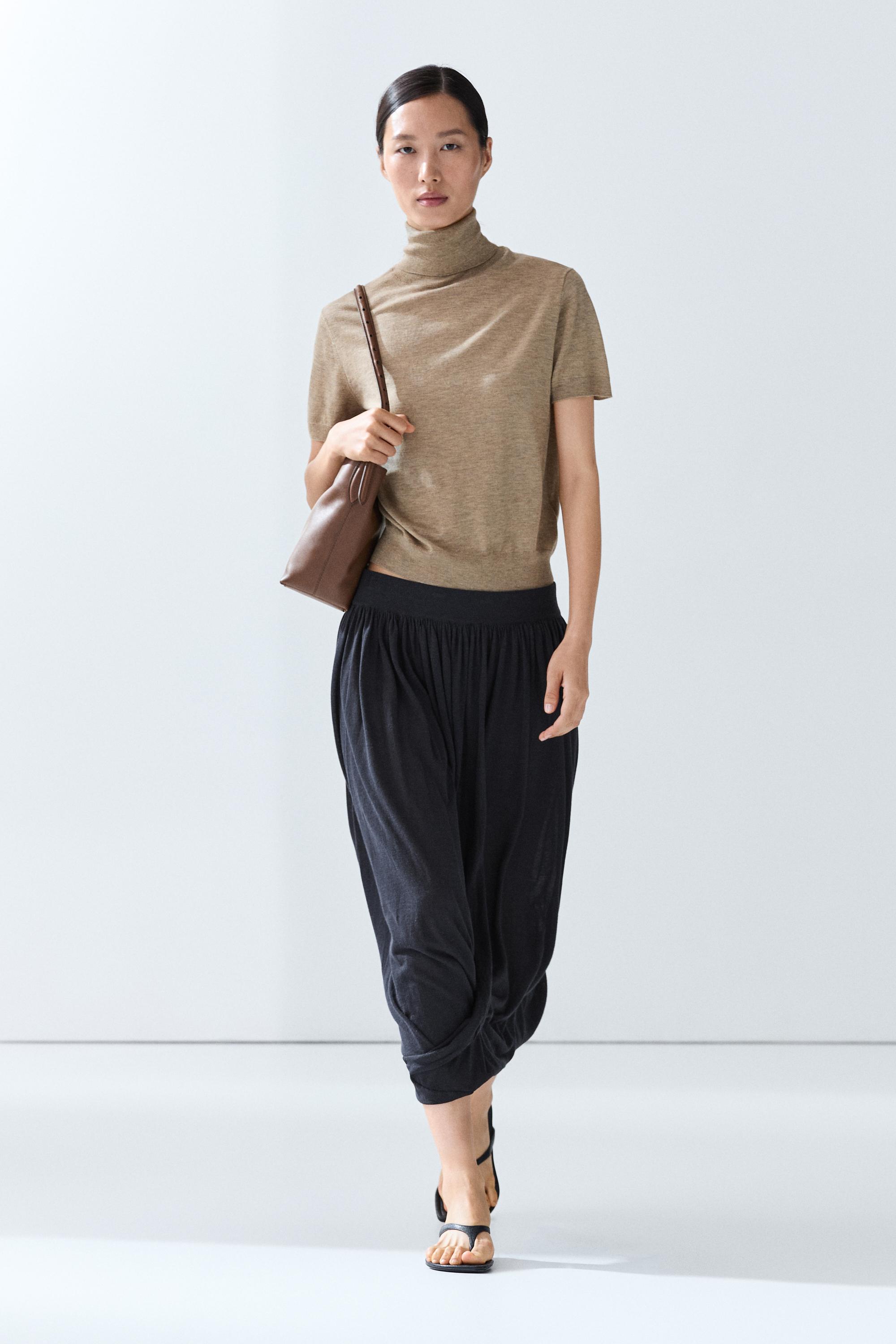 Turtleneck knit sweater — Beige marl