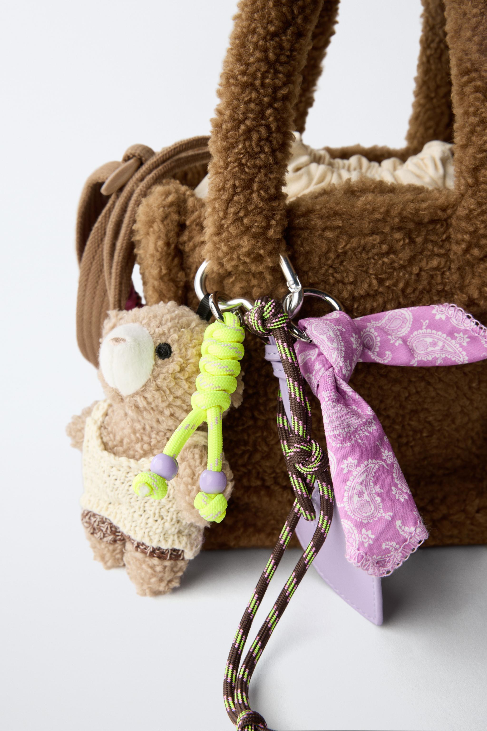 FLEECE CHARM CROSSBODY BAG