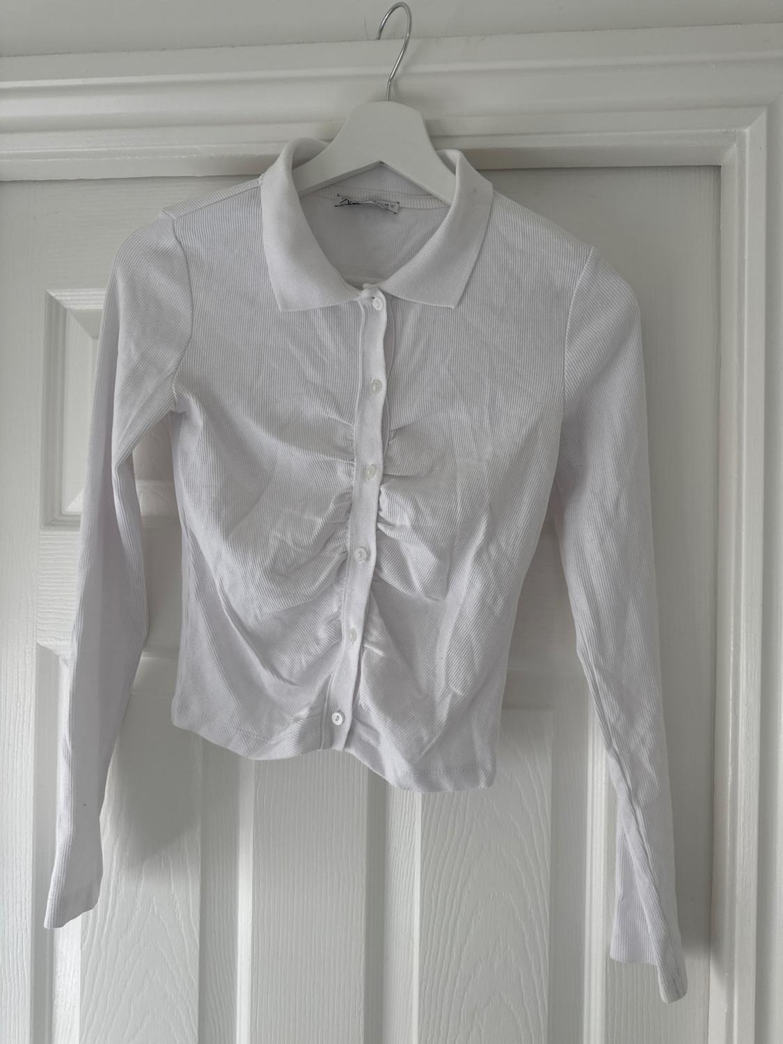 RIBBED POLO SHIRT WITH GATHERED DETAIL