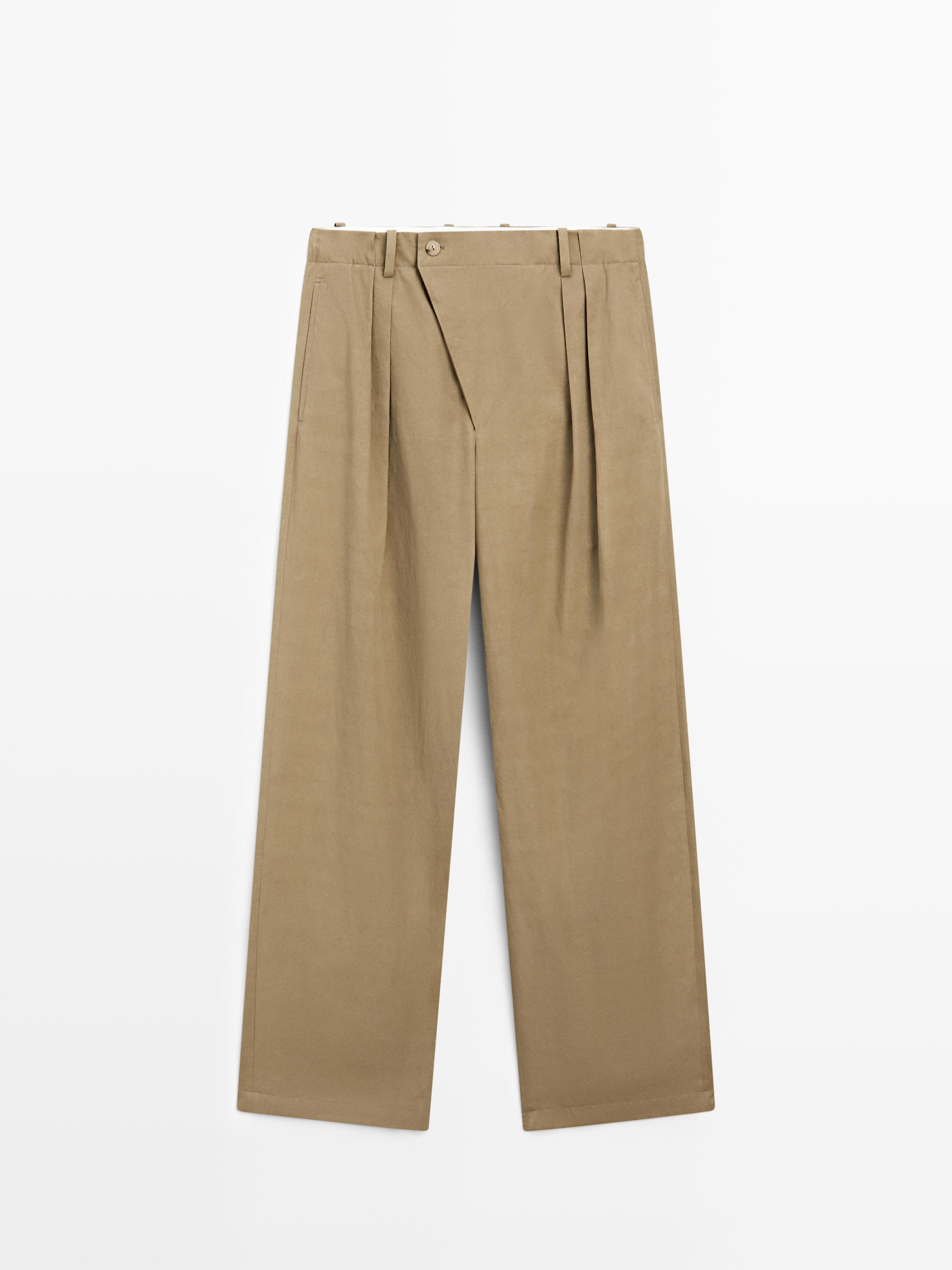 Pantalon à plis avec fermeture croisée - STUDIO