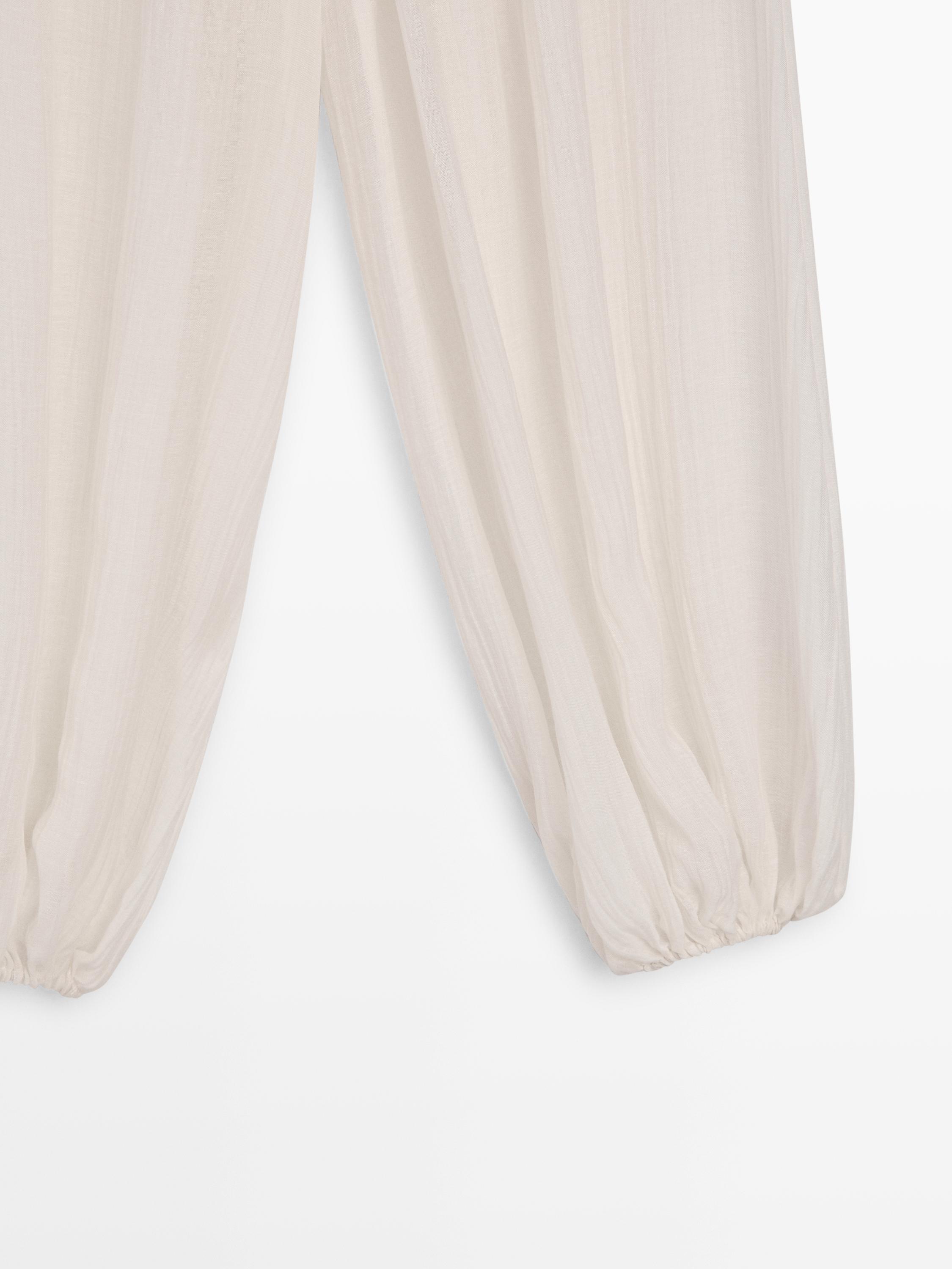 Flowing sarouel trousers with pleated detail