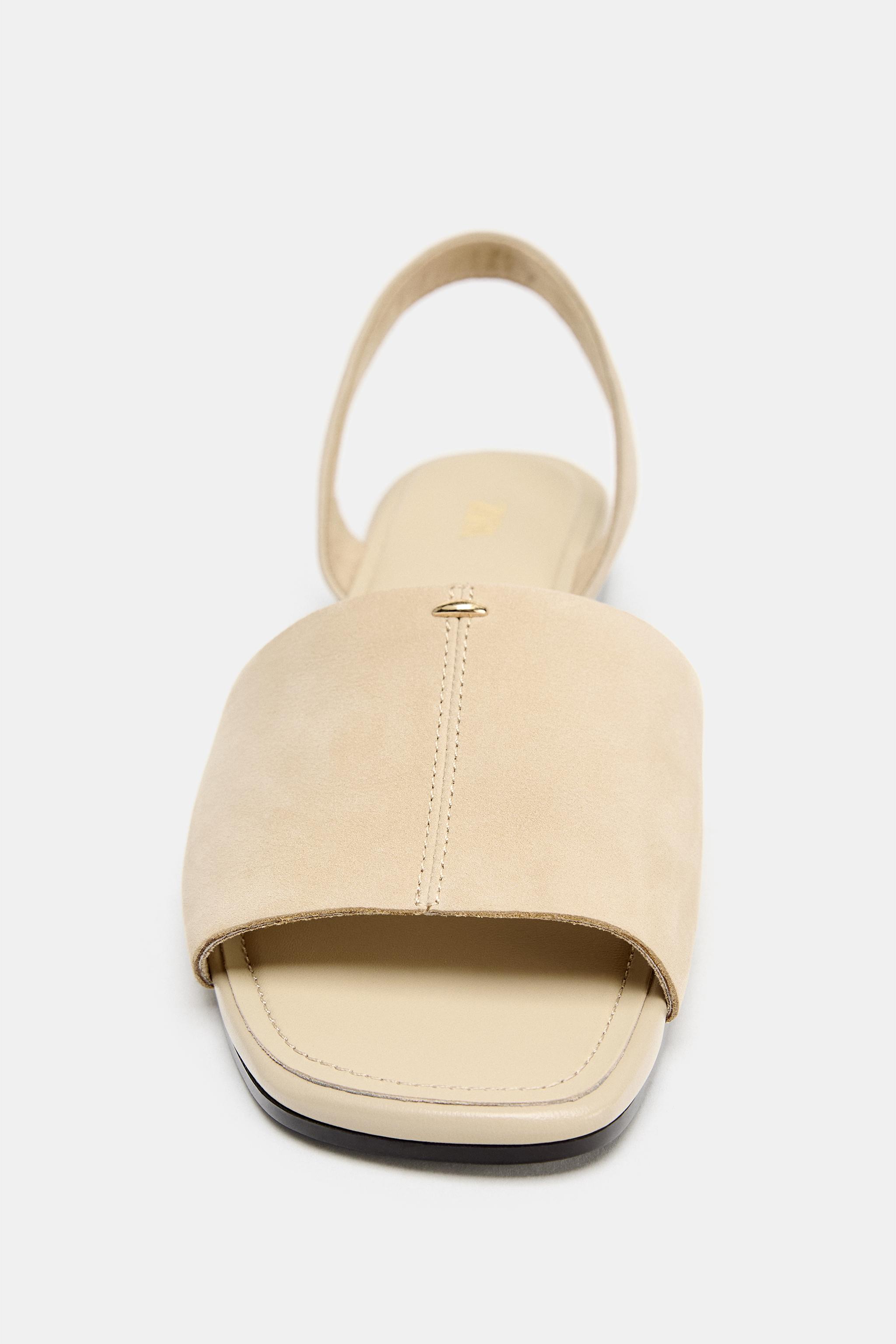 SANDALES PLATES EN CUIR À BRIDES