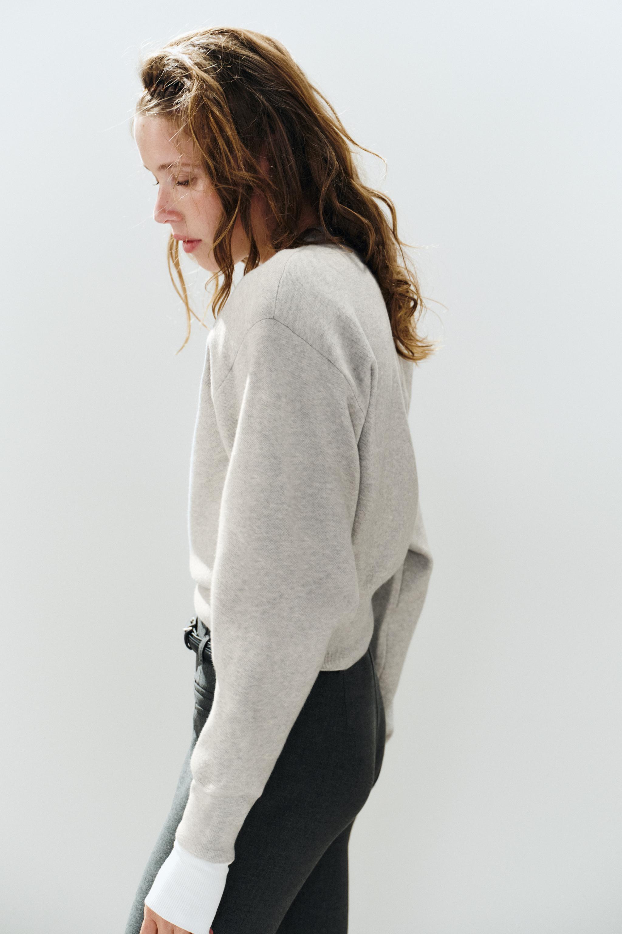 PULL EN MAILLE ÉPAULETTE