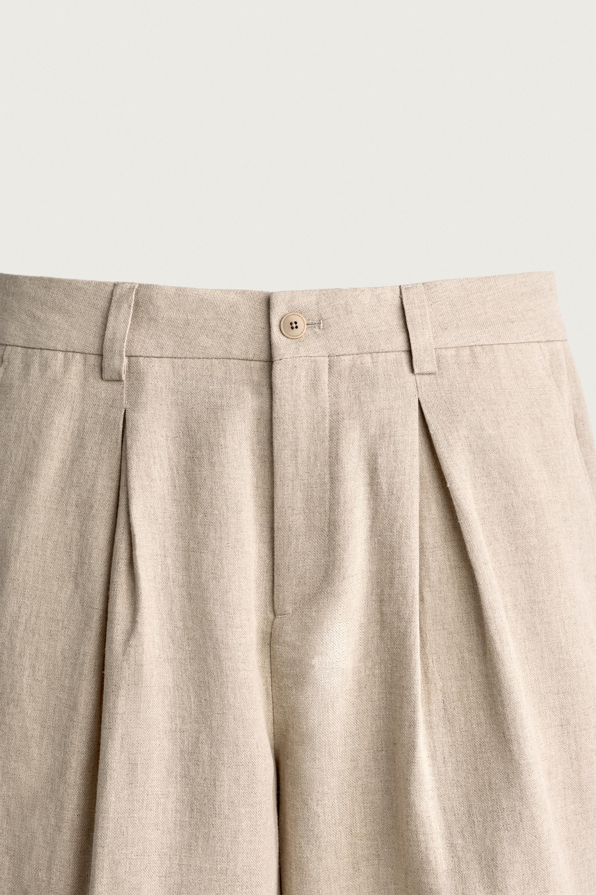 RELAXED FIT PLEATED SUIT PANTS