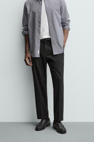 بنطلون صوف بقصة عادية غير قابل للكي - أسود by Zara