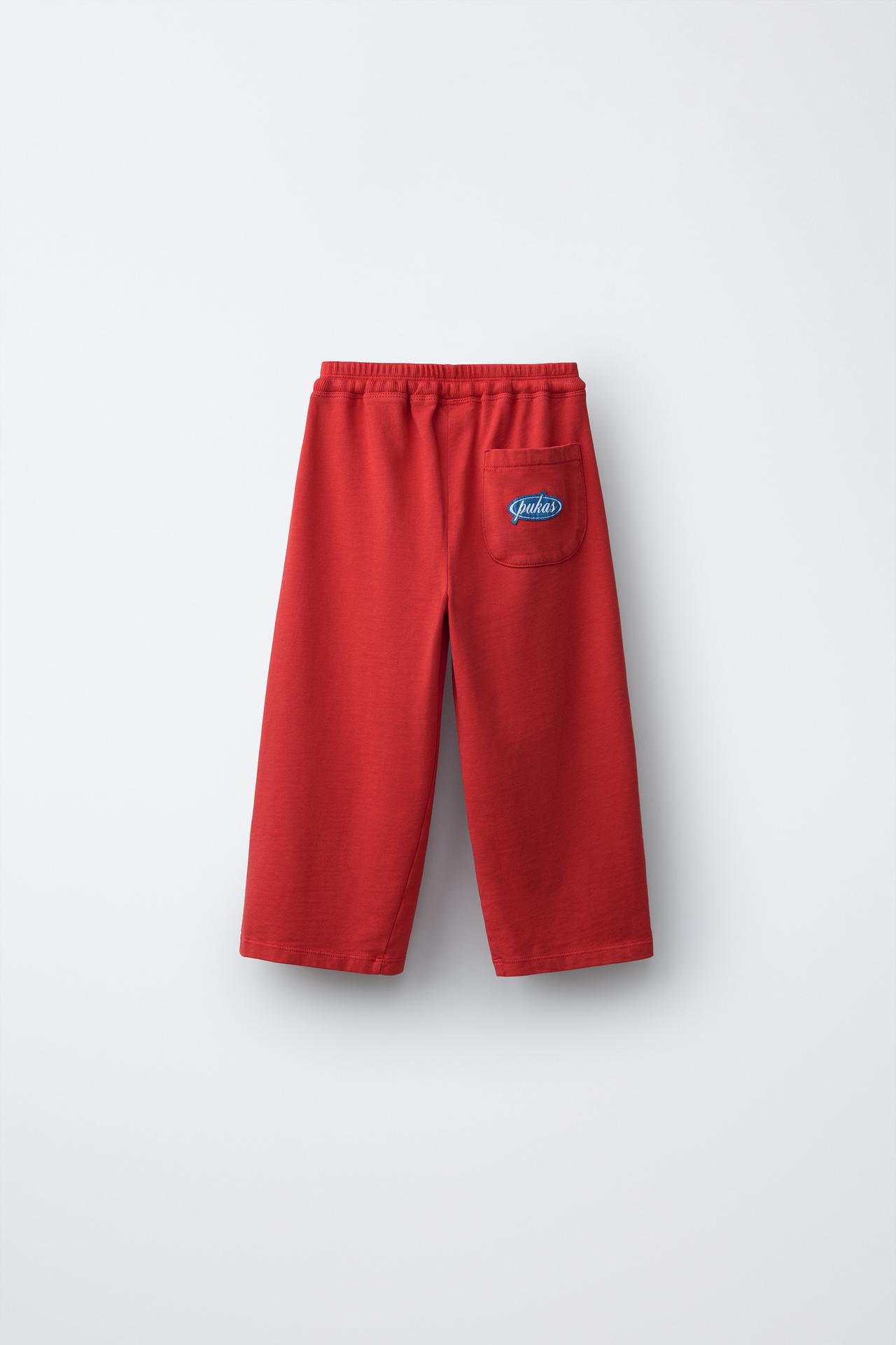 WIDE LEG PUKAS SURF PANTS — Red