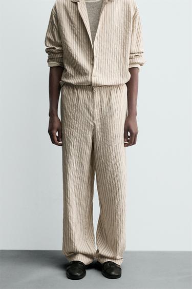 STRIPED WRINKLED-EFFECT FLOWING TROUSERS - Ecru by Zara