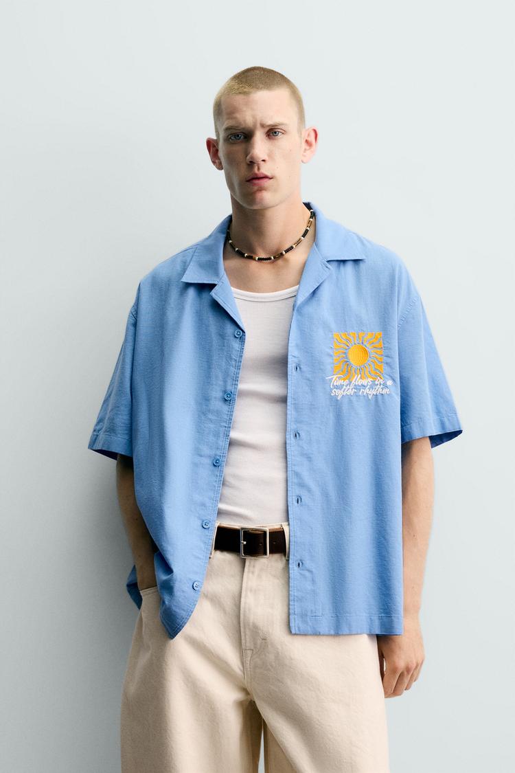 Camisa de corte relajado con bordado de sol 2