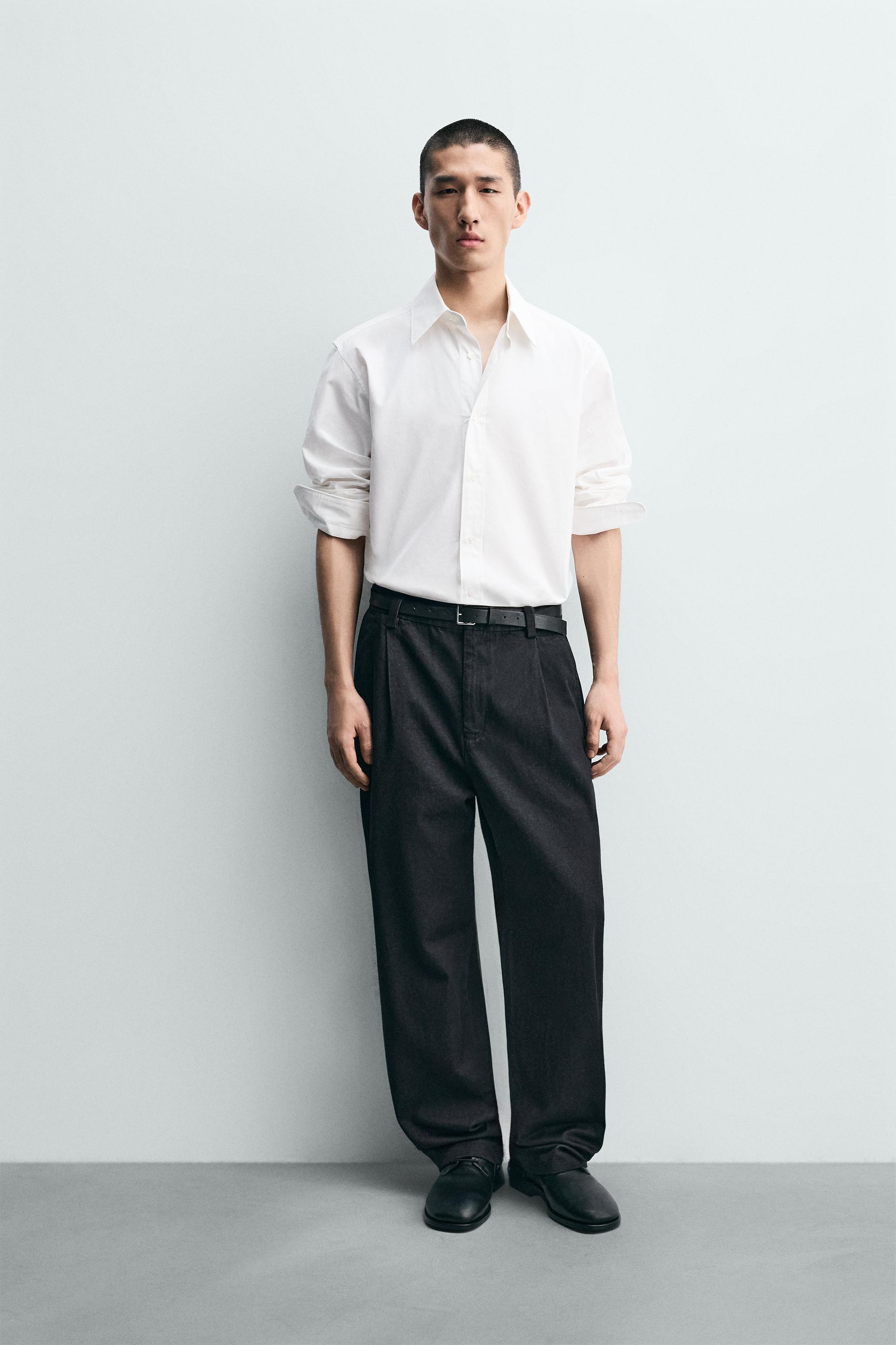 PANTALON CHINO EN DENIM À PLIS