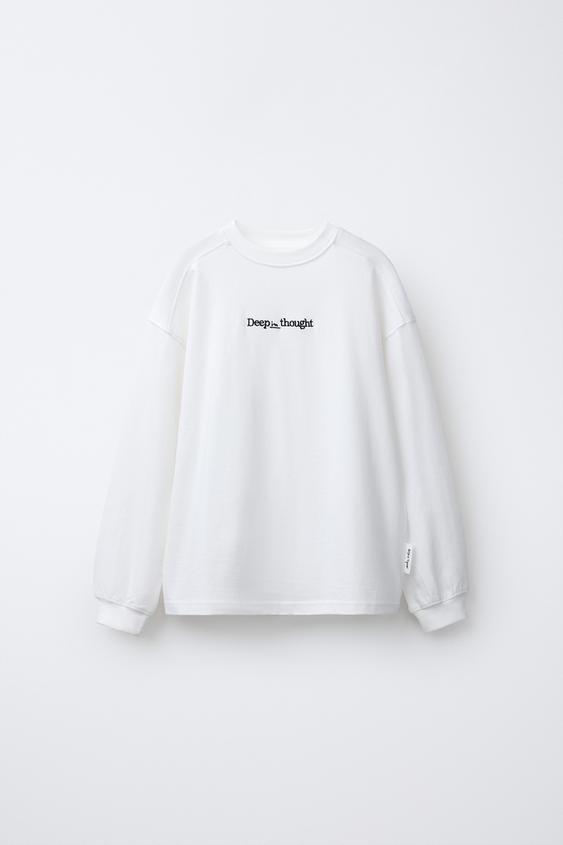 CAMISETA TEXTO BORDADO - Blanco roto de Zara - Imagen 0