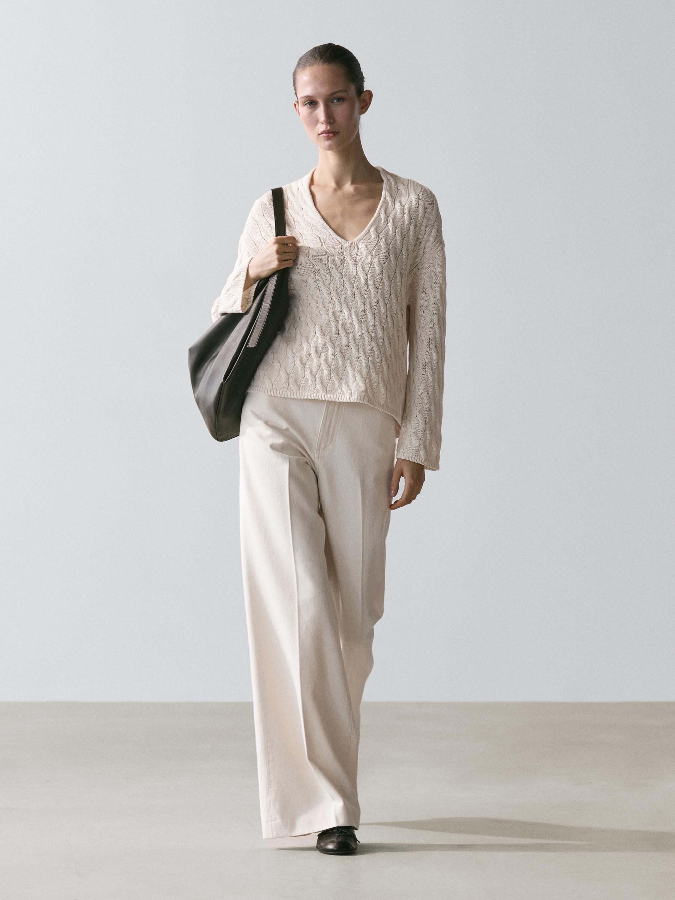 Cotton blend knit sweater with knot details