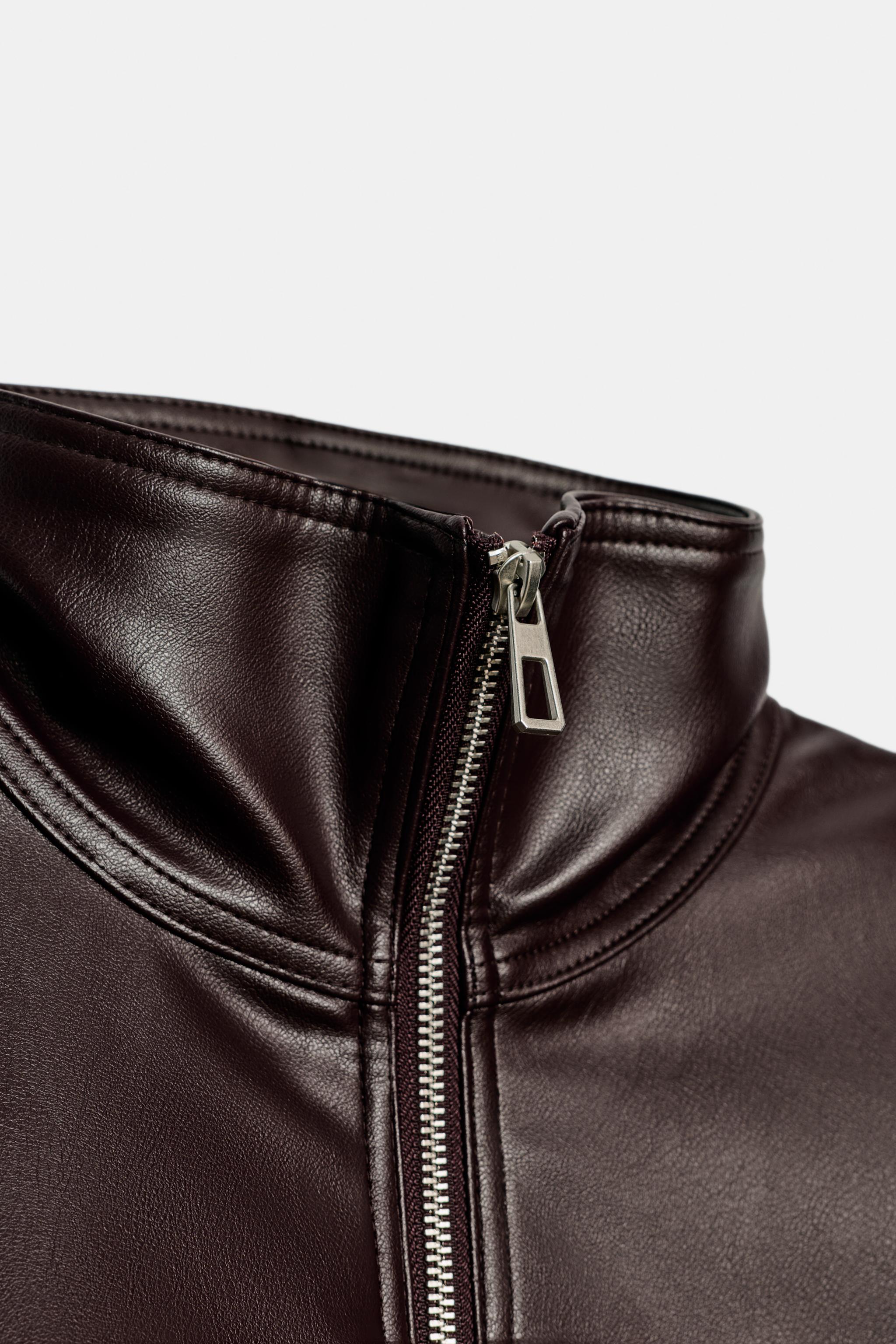 VESTE EN MATIÈRE SYNTHÉTIQUE À TAILLE AJUSTABLE
