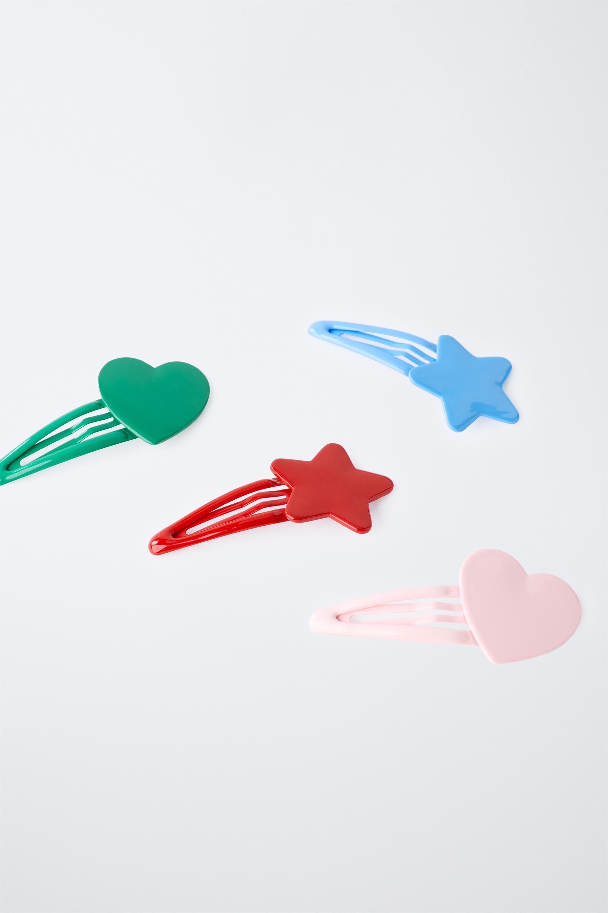 FOUR-PACK OF STAR AND HEART HAIR CLIPS — Multicolored