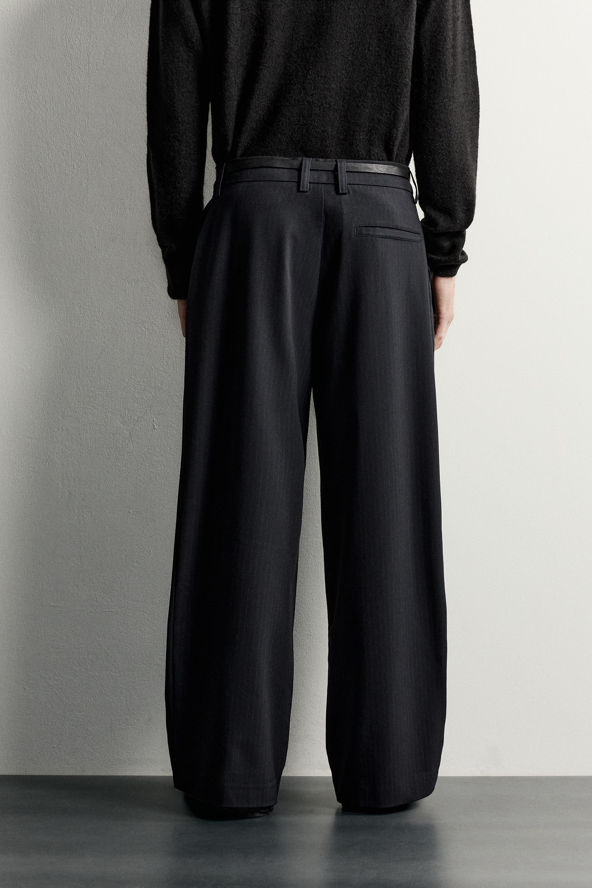 PANTALON COUPE LARGE À PLIS INVERSÉS