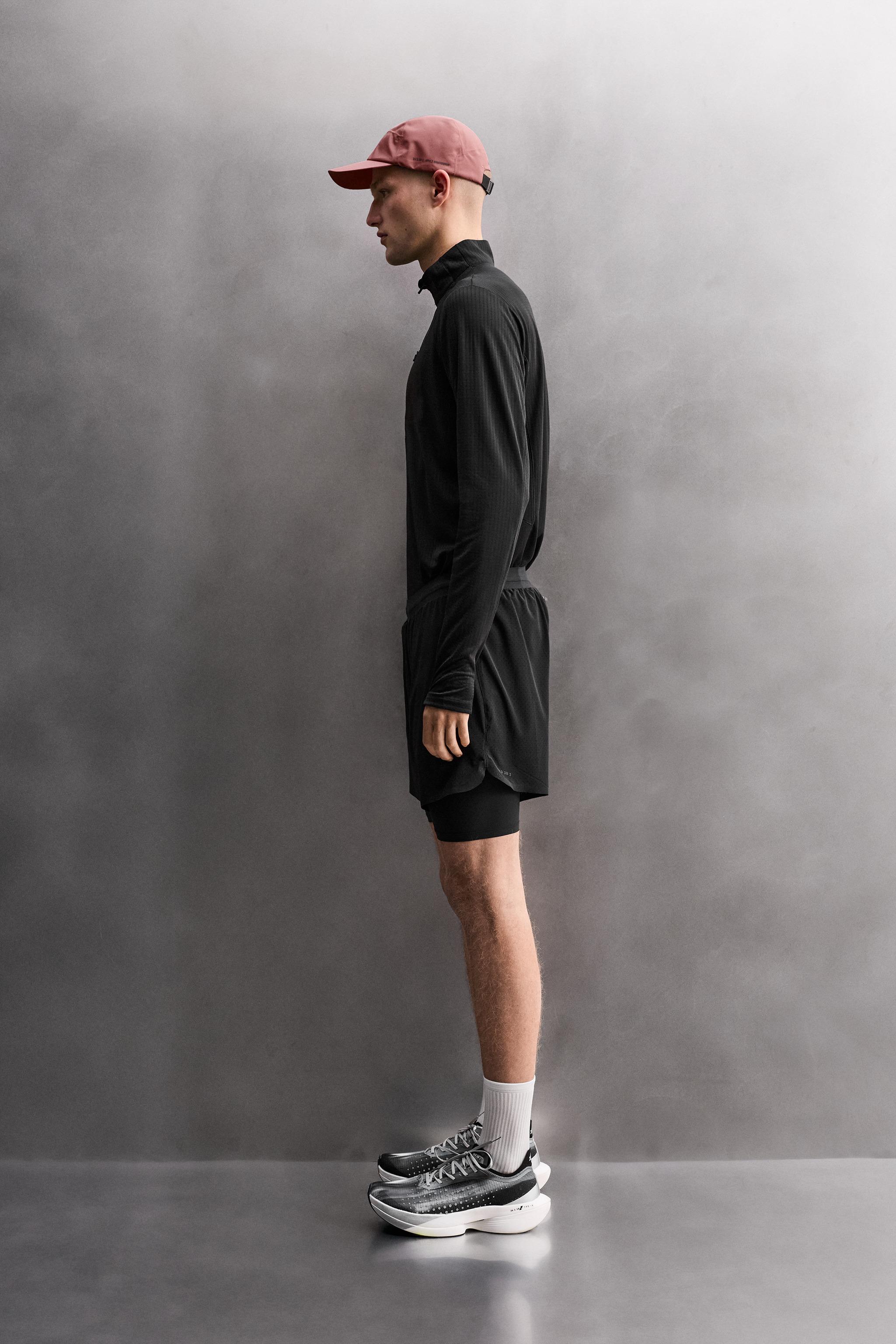 COMBINATION POCKET QUARTER-ZIP SWEATSHIRT